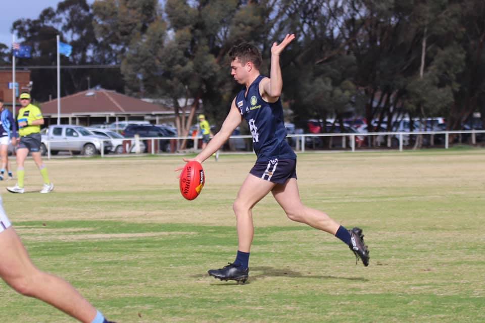 Precision ... Josh Hoffmann hits up a teammate with his laser kicking. 
