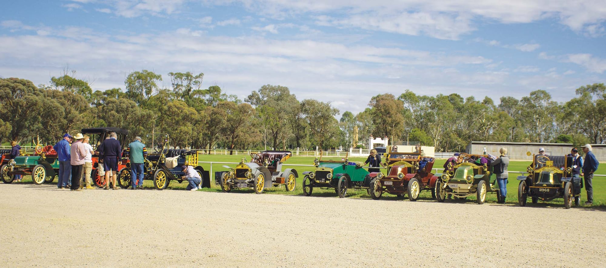 A real attraction ... The vintage cars provoked plenty of interest when they stopped at Numurkah Golf Club on Saturday. 
