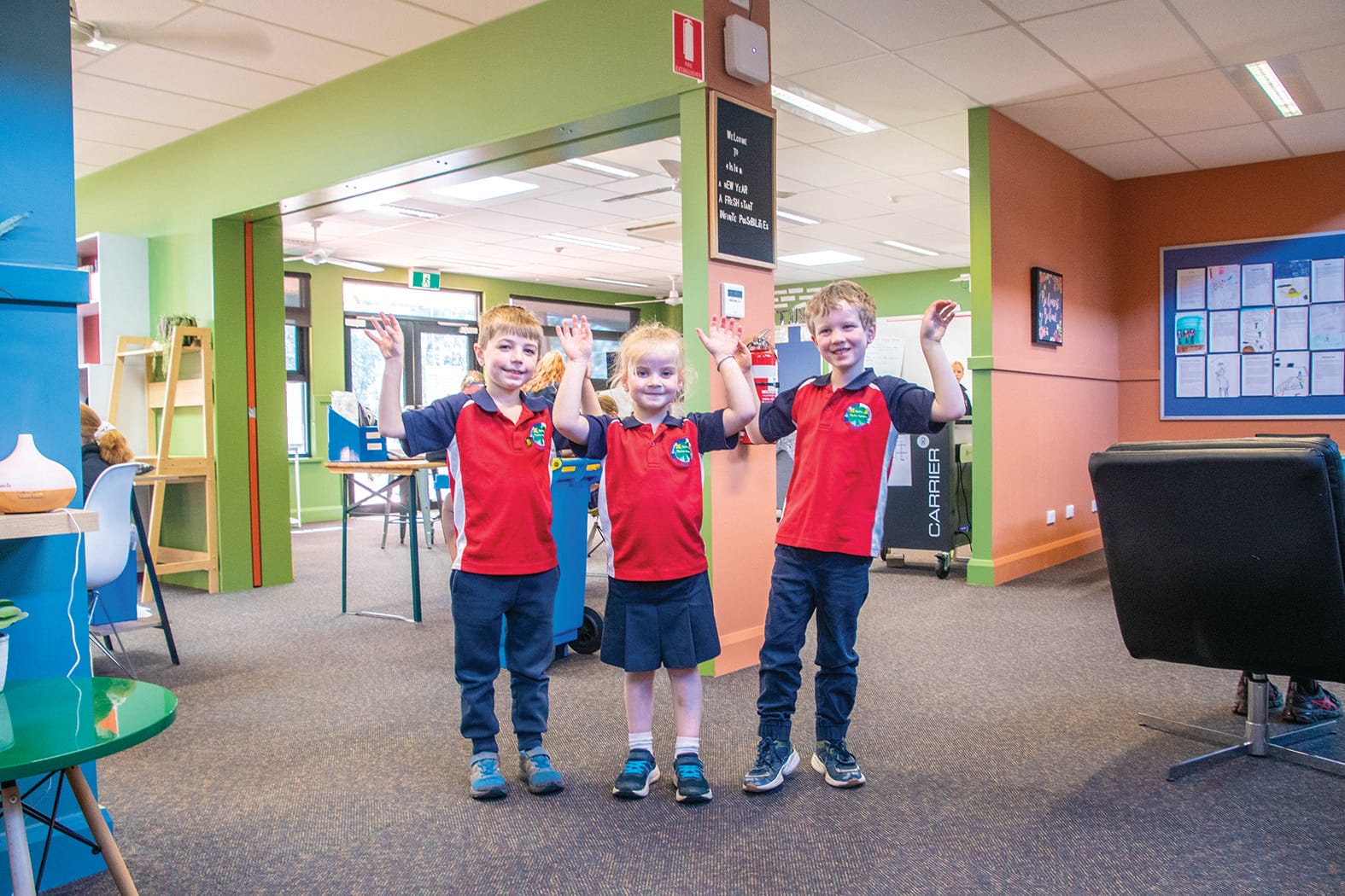 Colourful classrooms... (From left): Ryder Harris, Violet Brennan and Bryce Stacpoole love their new learning spaces.
