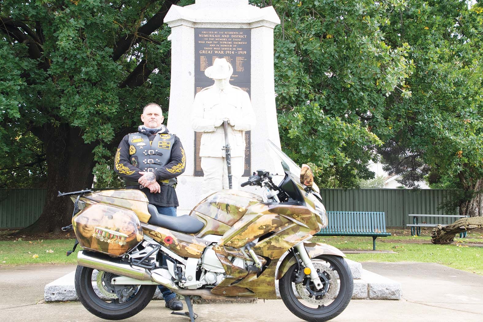 Unique tribute... Stephen Partington proudly displays his family’s military service on his bike  on a visit home to Numurkah ahead of Anzac Day this week. 

