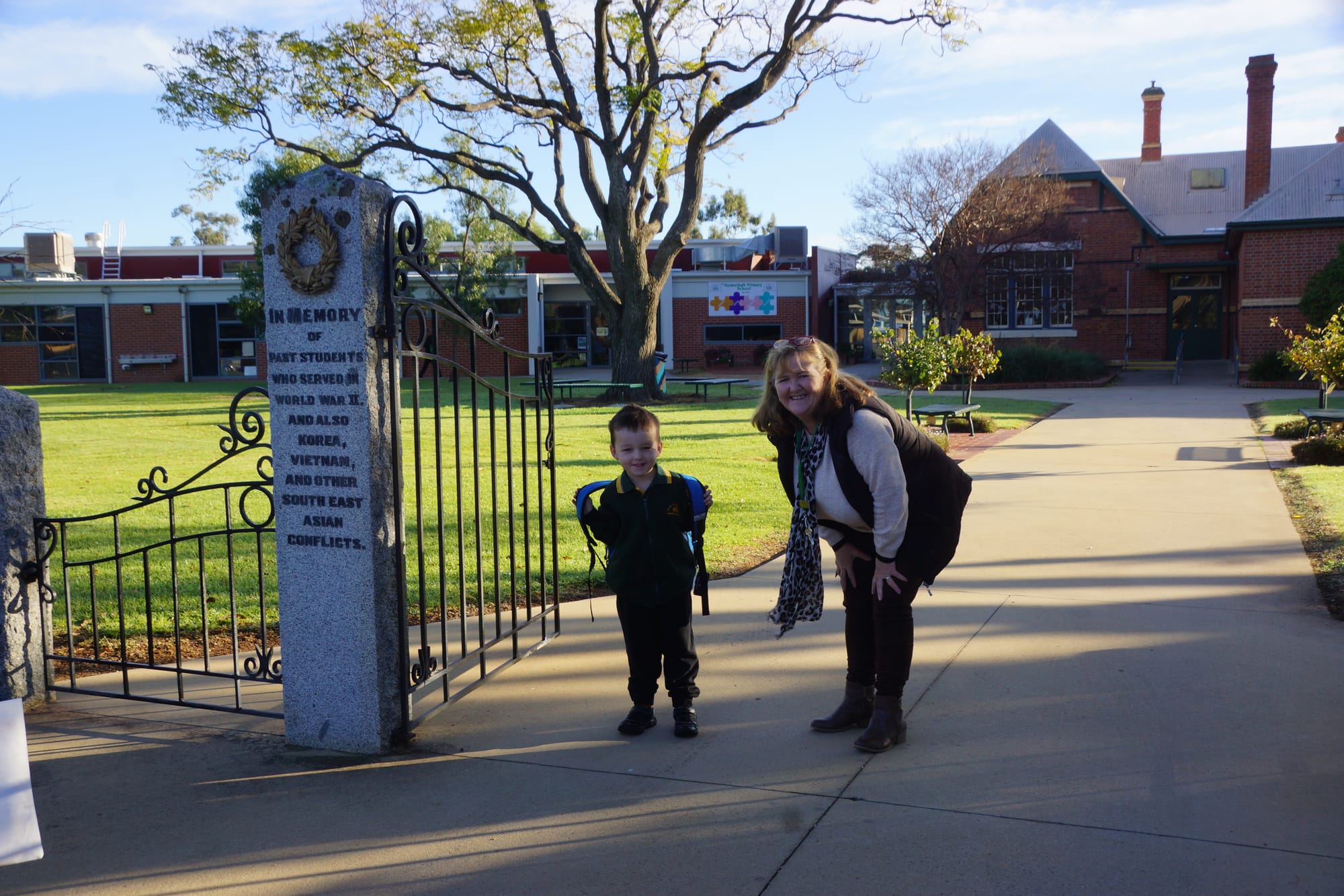 Welcome back ...Numurkah Primary School principal Deb Oliver welcomes Dylan Black back to school yesterday.