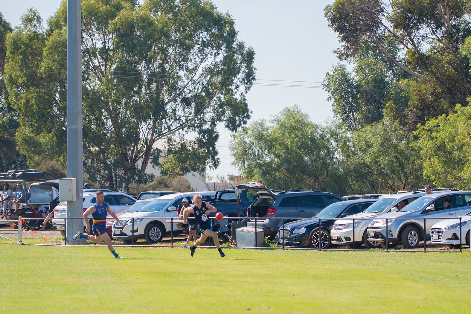 Young star ... Jarrod Holmes chases a ball down on the wing.
