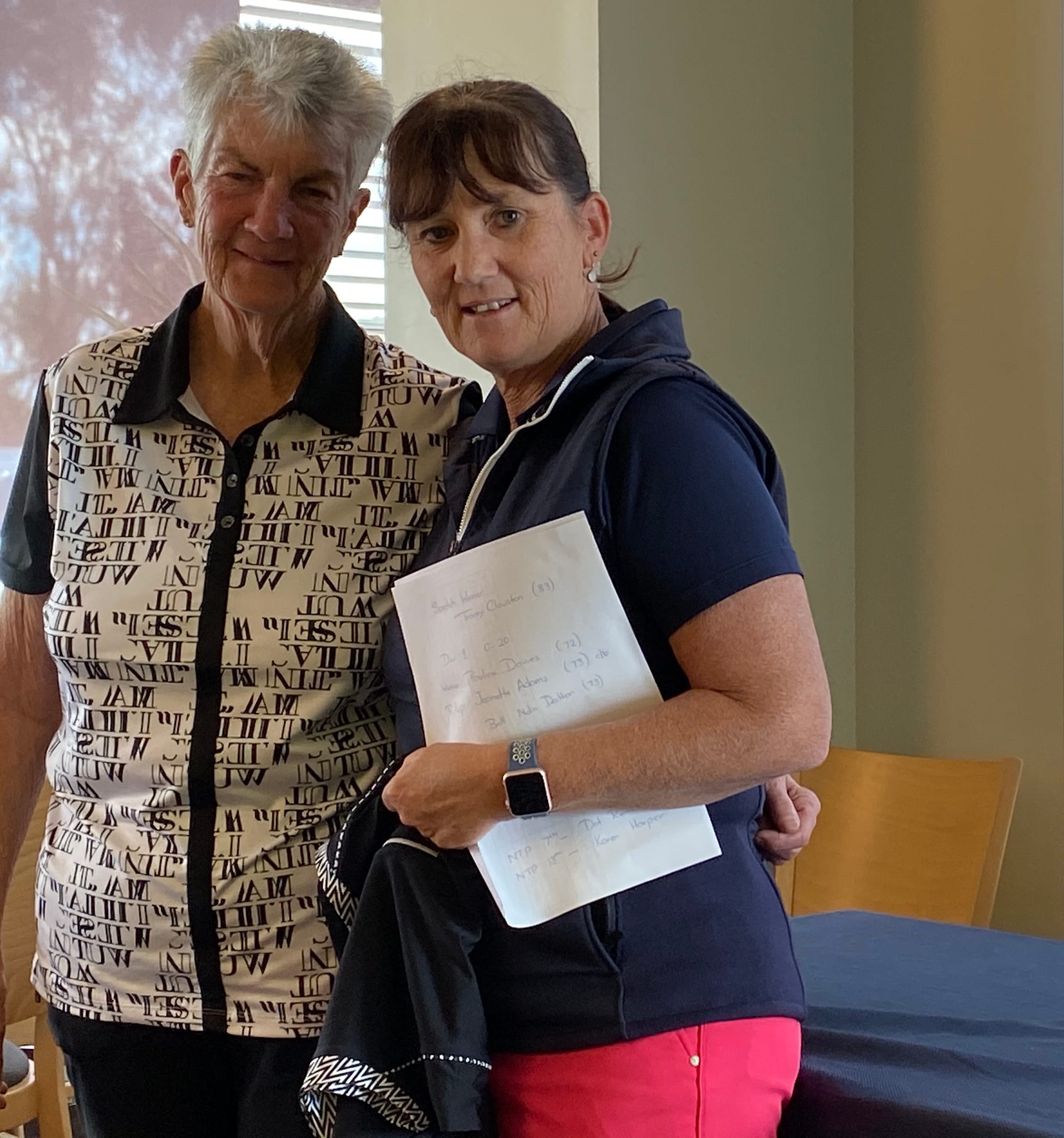 Scratch winner ... Representing the sponsor, Shepparton Optical Services, Helen Schmedje presents the winners’ prize to Tracey Clouston.