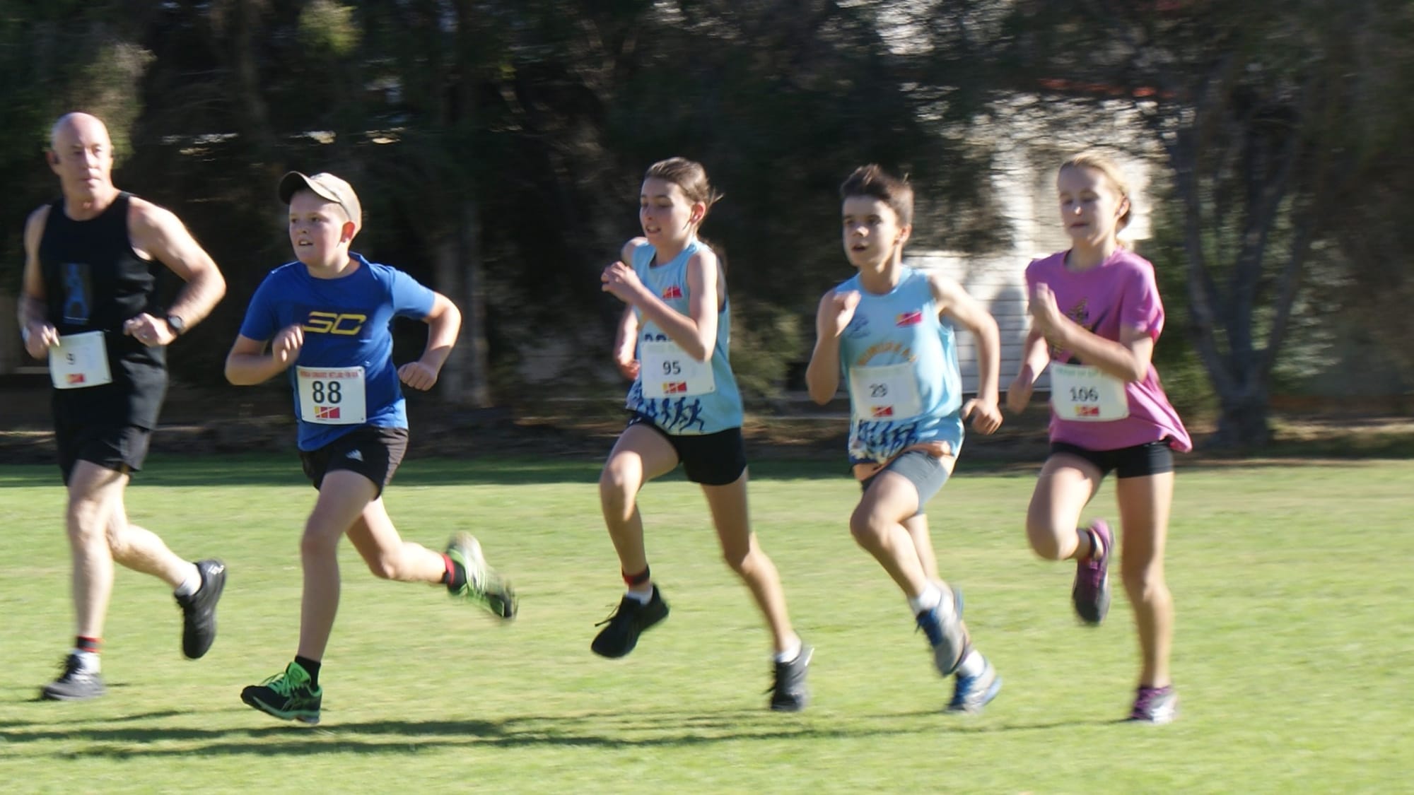 Fun for all ages...Nash Siermans, Jess Laidlaw, Toby Bell and Jamison Shelton race to the finish in one of the primary school age events. 
