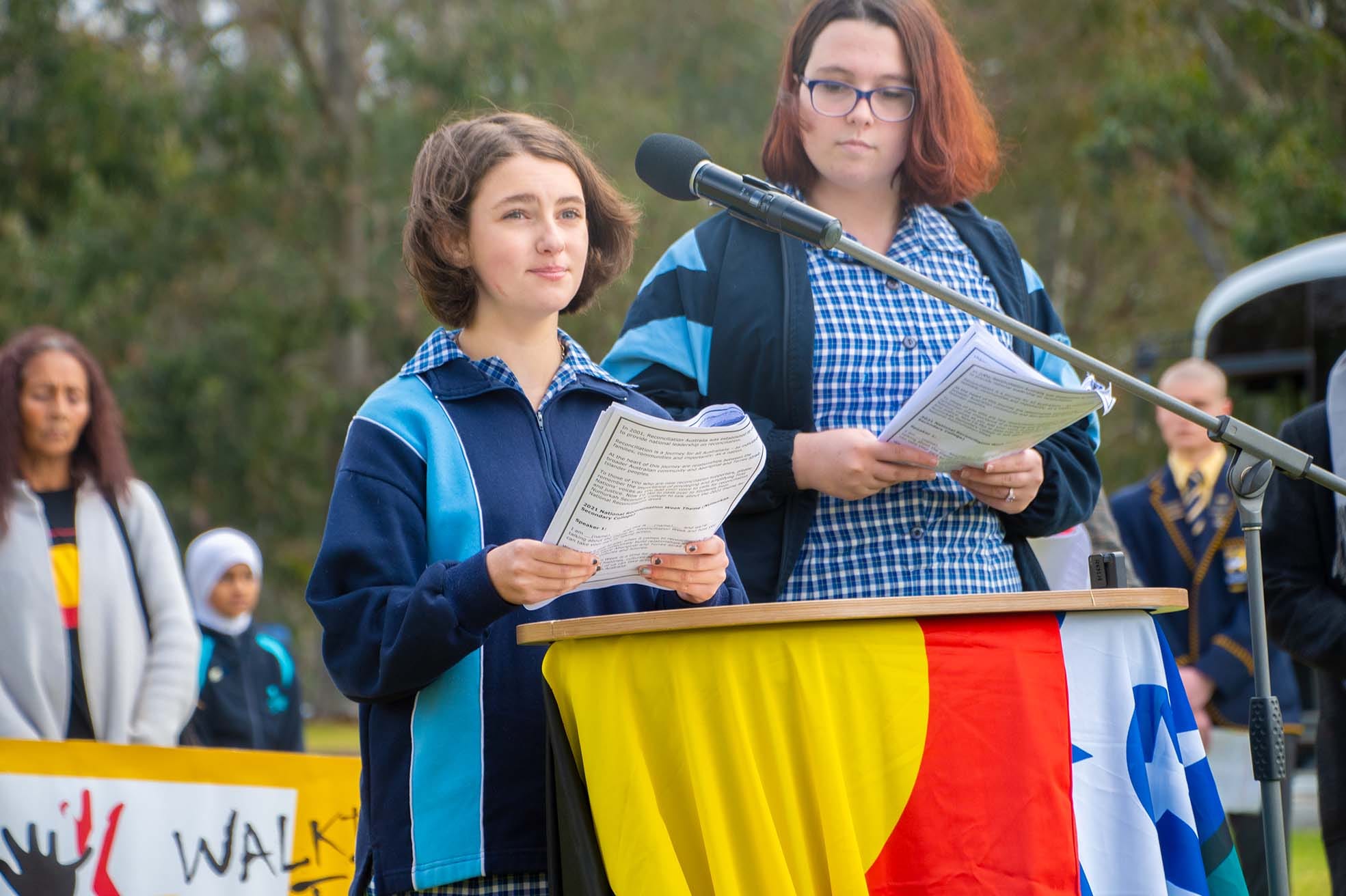 Student leaders ... Numurkah Secondary School students Phoebe Zammit (left) and Ainsleigh Banner spoke about the theme of national reconciliation week.
