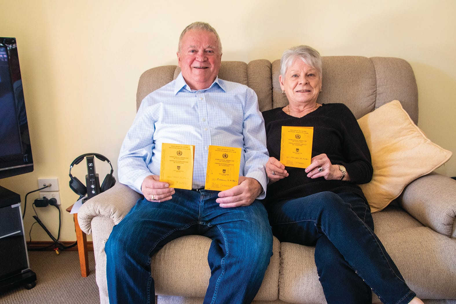 Just get the jab ... Maureen and Graham Millen found their old vaccination certificates, proving that it’s nothing new. 
