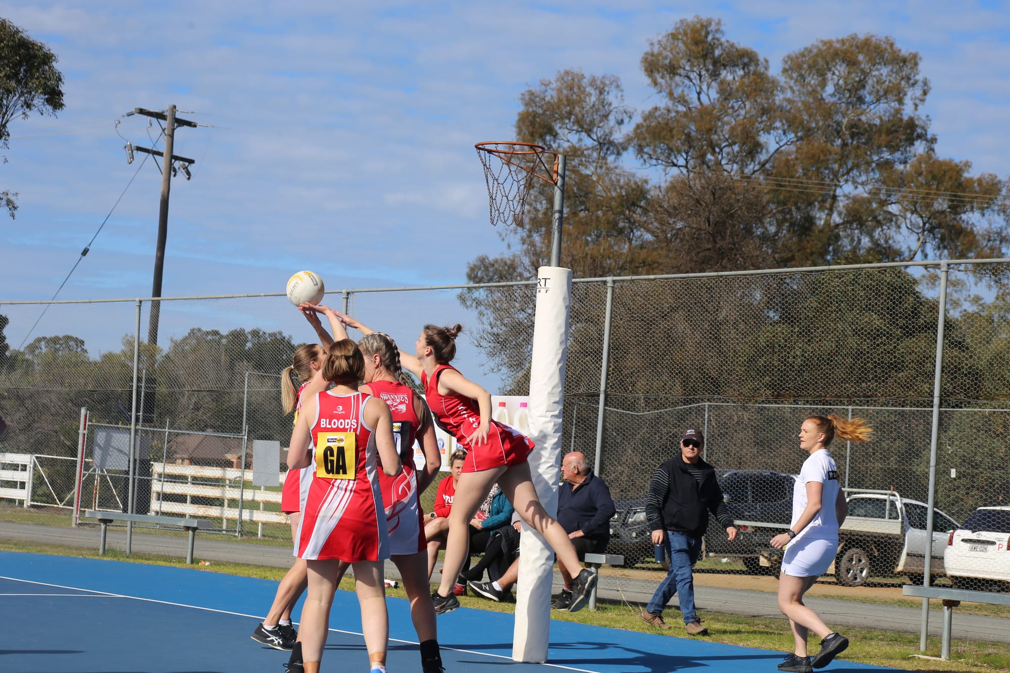 Action shot ... Sarah Weidemann jumps up to defend a Tocumwal shot at goal. 