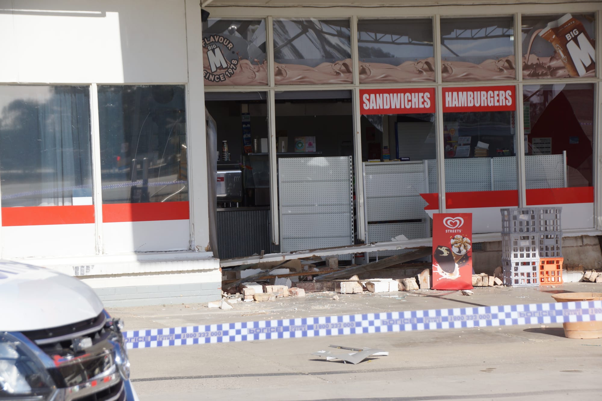 Extensive damage ... The brazen thieves reversed straight into the front of the store where the ATM was located.