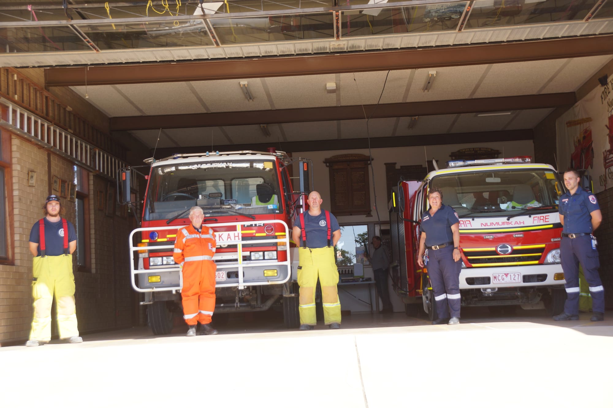 Doing their job, but keeping a distance .... Tyler Cox, Johnny Decker, Jason Cox, BronwynMcKenzie and Tim Mallon. 