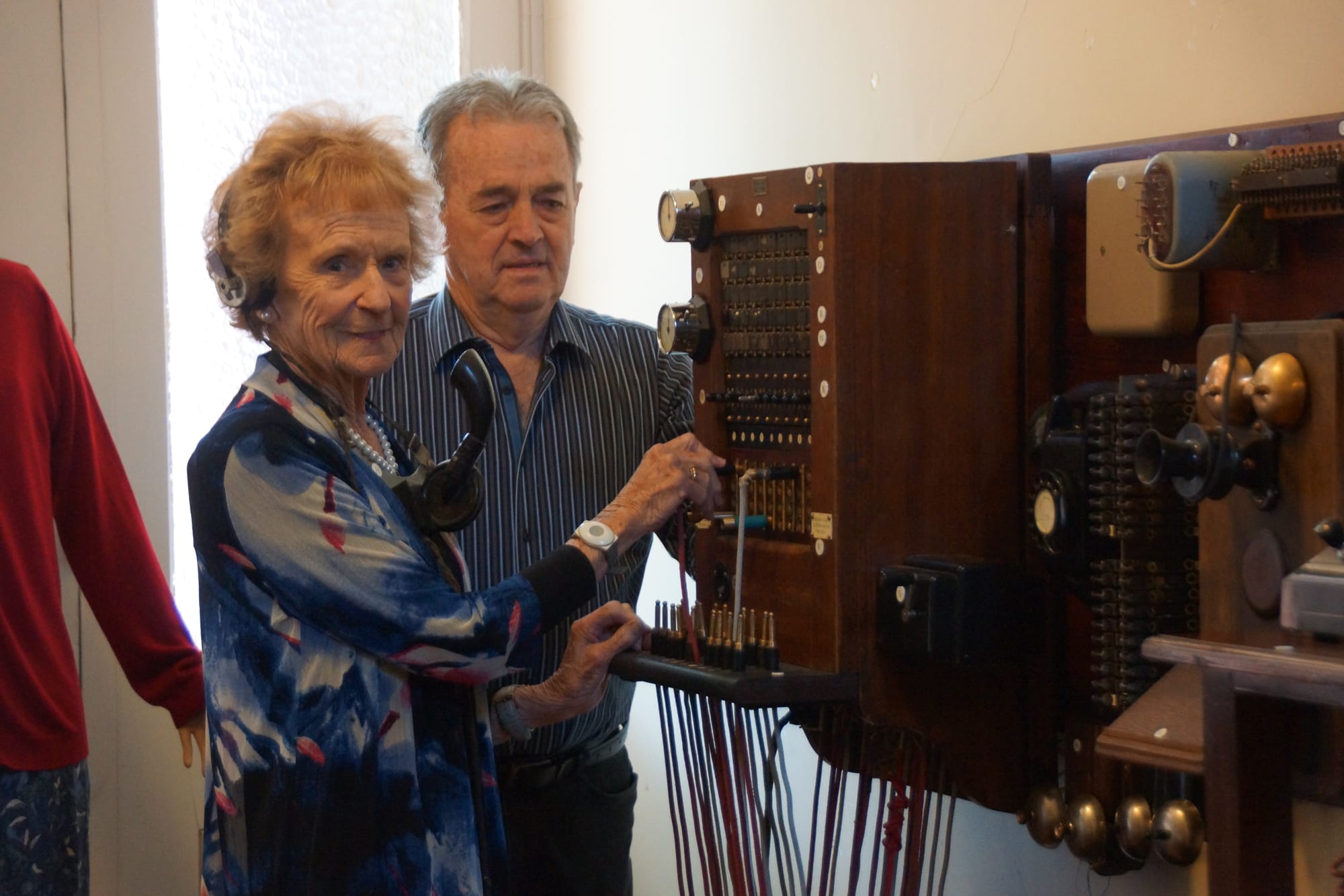 Dialling memory lane ... Former telephone operator Lorna Morris finds it all coming back as Peter Bilston shows her the restored exchange.