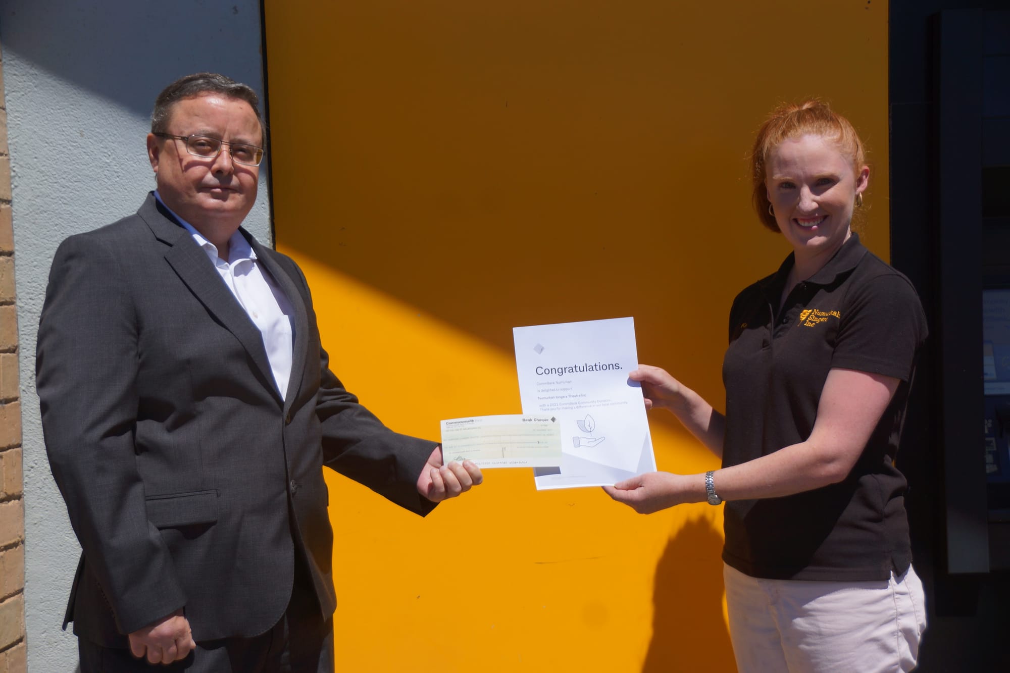 Keeping the music alive... Numurkah Commonwealth Bank acting branch manager Alex Candlish (left) presents a cheque for $500 to Numurkah Singers assistant secretary Kelsey Dealy. 
