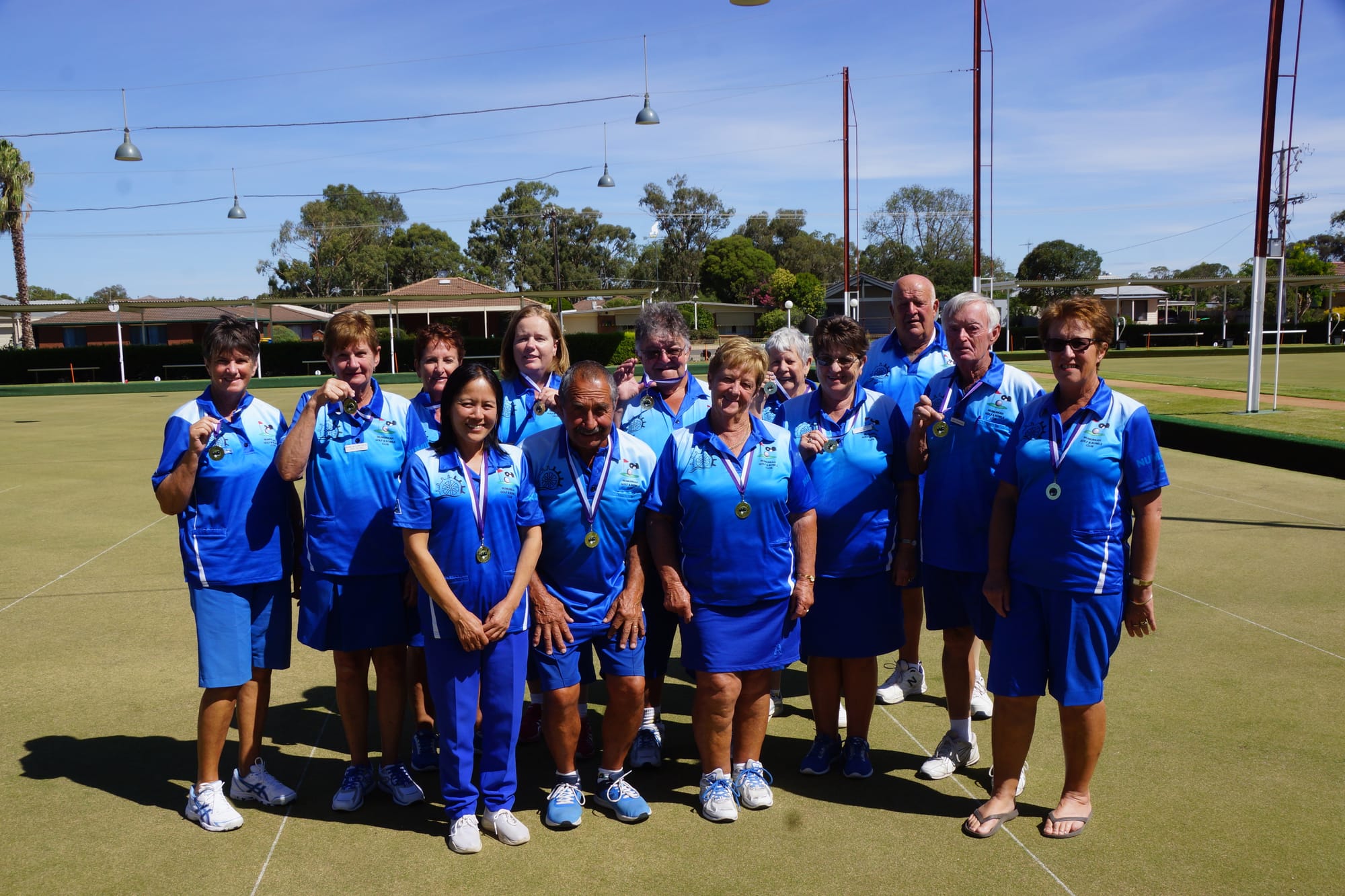 Winners are certainly grinners ... (From left): Yvonne Clark, Jan Niven, Lyn Browning, Linda Isted, Katrina Glover, Joe Luci, Des Staggard, Robyn Hodgkin, Kaye Hocking, Jenny Sutcliffe, Butch Browning, Ian Hocking, Loris Houlihan.