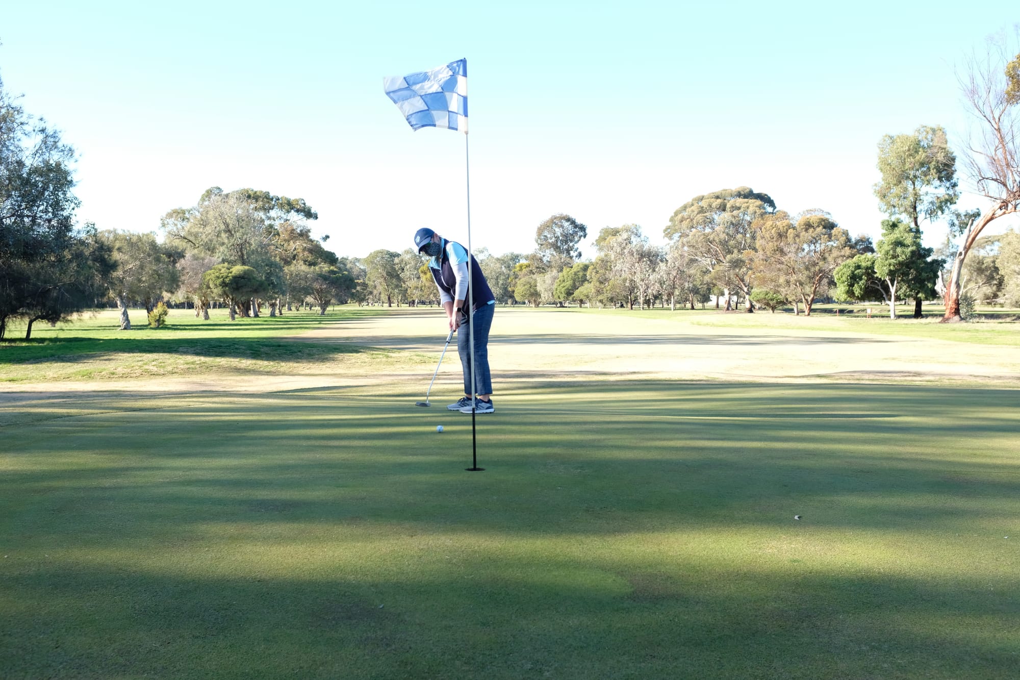 Putting for glory ... Tracey Clouston tries to sink one from about 12 feet. 
