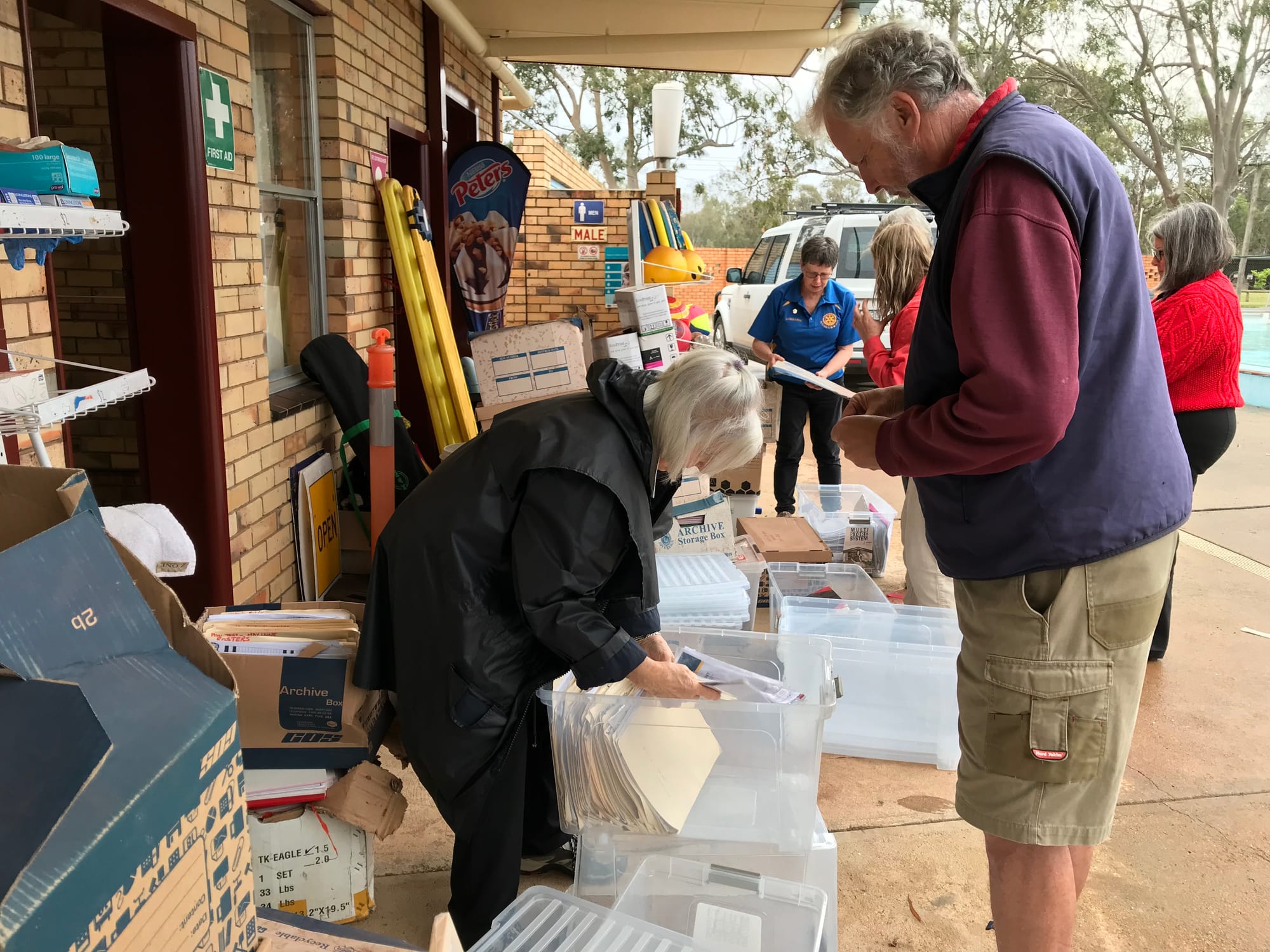 Big improvement ... Numurkah Rotary Club members at work at the Numurkah swimming pool.