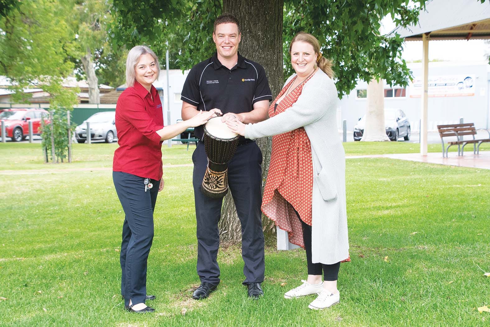 Drumming up wellness ... NCN Health community development officer Nicole Wells, Bendigo Community Bank Numurkah’s Brayden Carey and counsellor and life coach Amelia Slater are pleased to be working together on the Thriving together Numurkah program. 