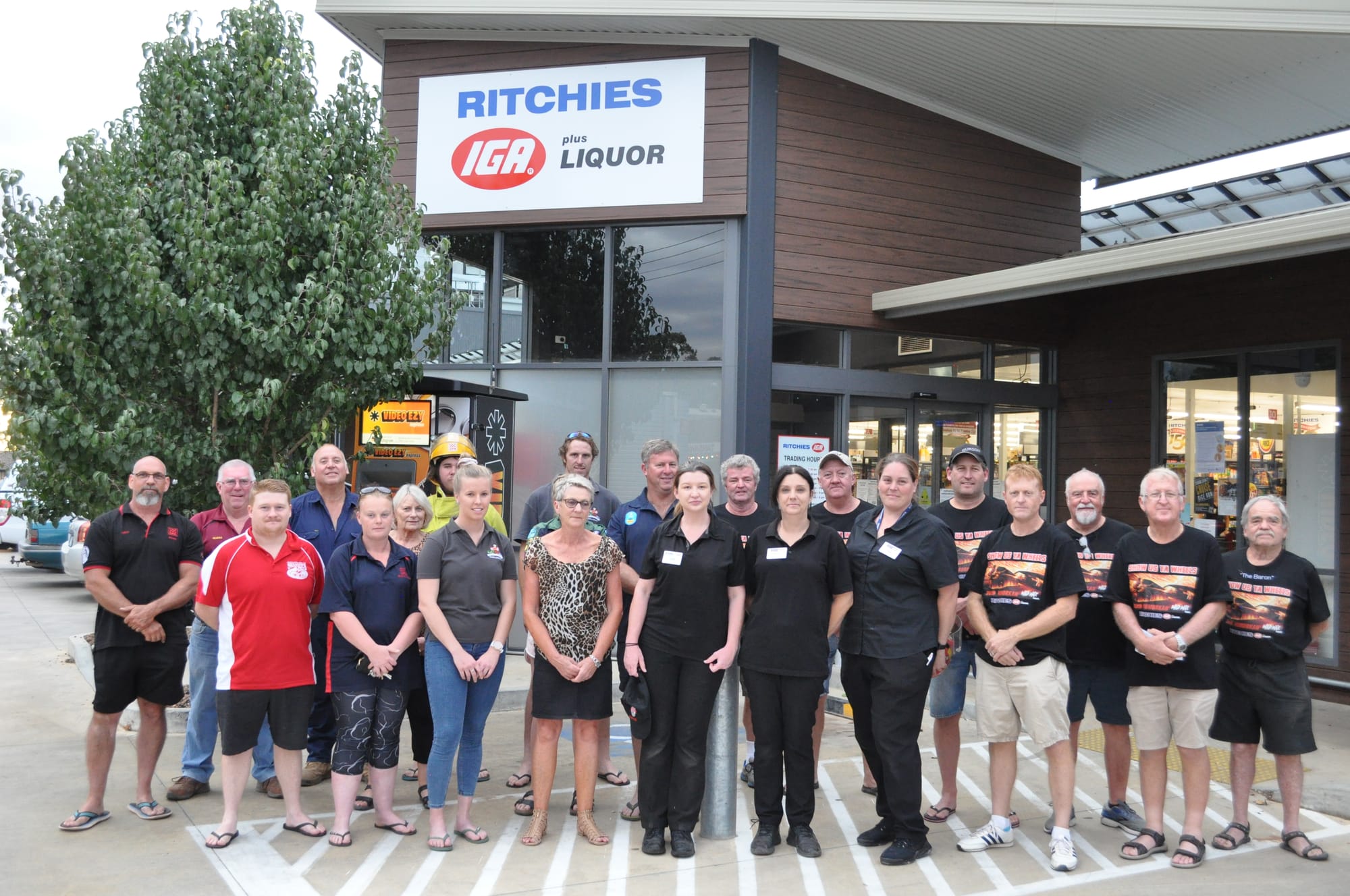 All donations gratefully accepted ... Show Us Ya Wheels committee members, Ritchies IGA staff and representatives of local community groups gathered for the cheque presentation last Thursday. 