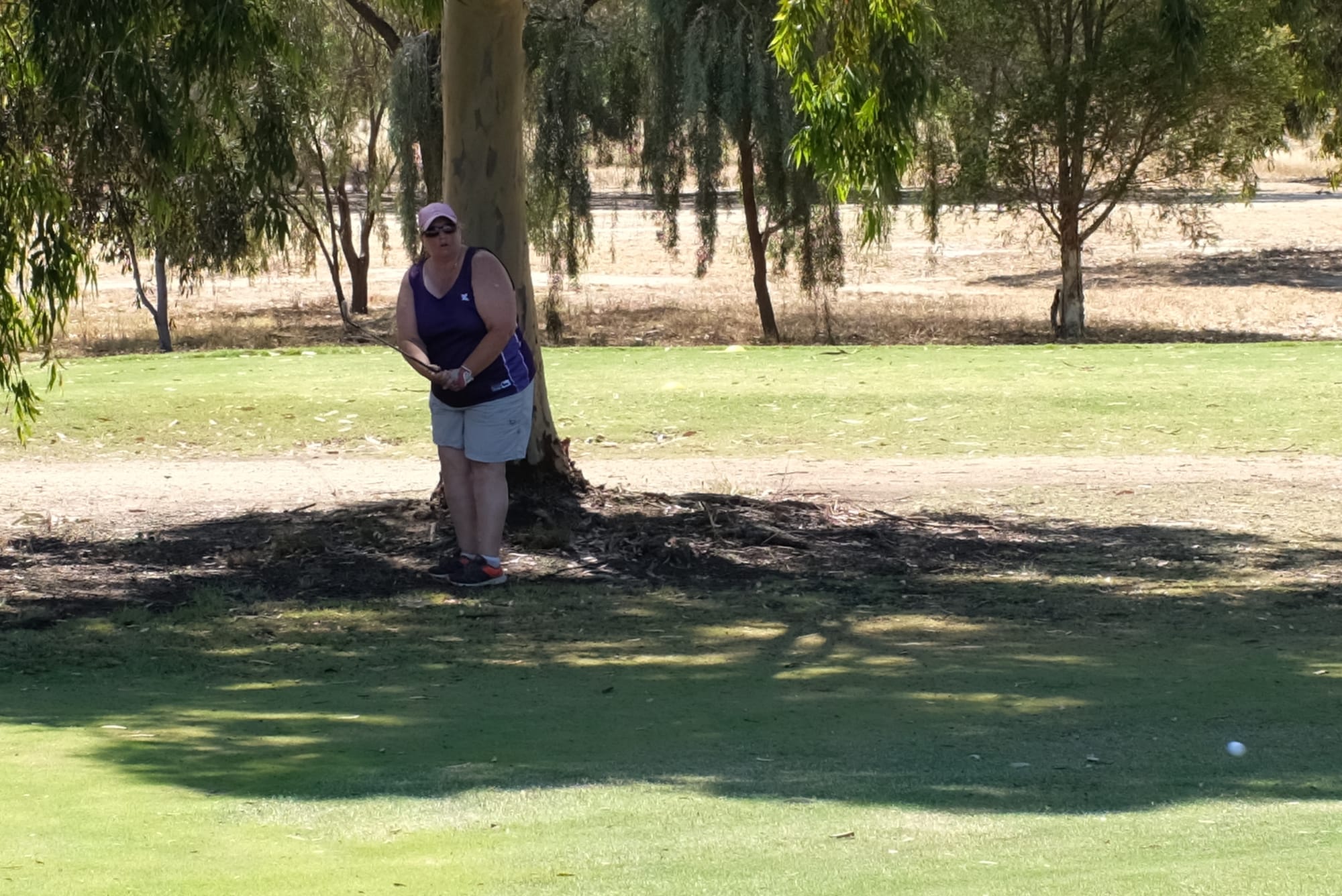 Good scramble … Karen Harper watches her ball onto the green on Saturday.
