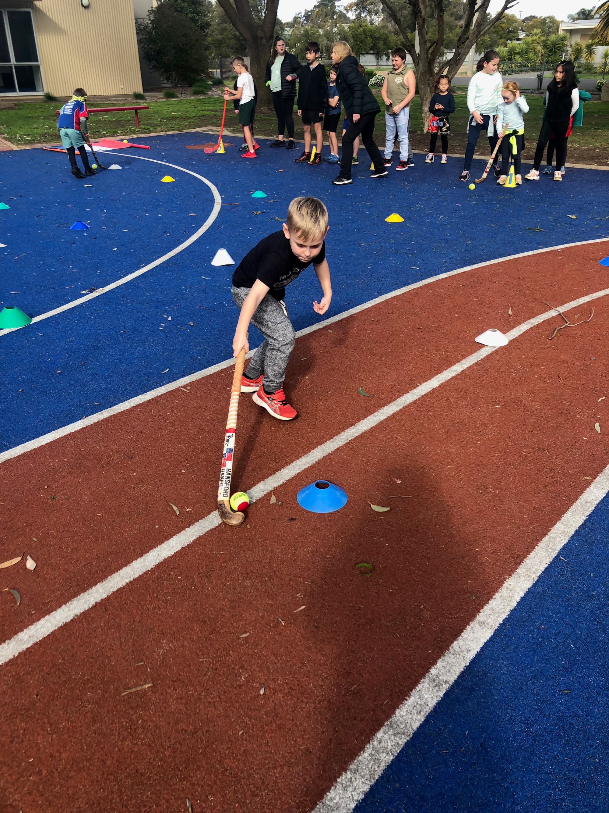 Traditional skills... Izayk Edgar practises his hockey skills.

