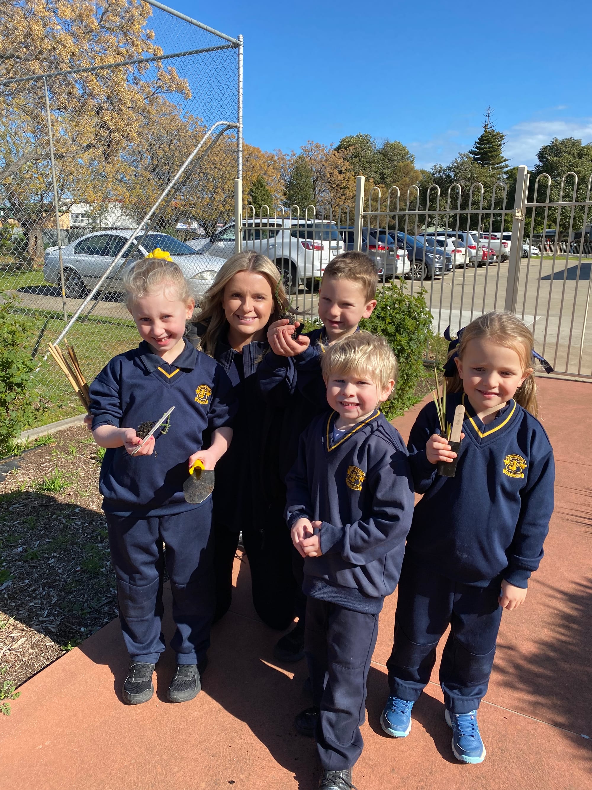 Fun in the garden ... (From left): Edan Doncon, Rachael Morrison, Jack Glass, Axel Collins and Emma Reade last Friday on National Tree Day.
