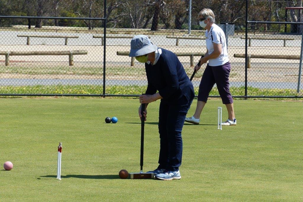 Happy to be back ... Association croquet players Maria Kempton and Cheryl O’Dwyer at practise last Friday, enjoying being back on the court.