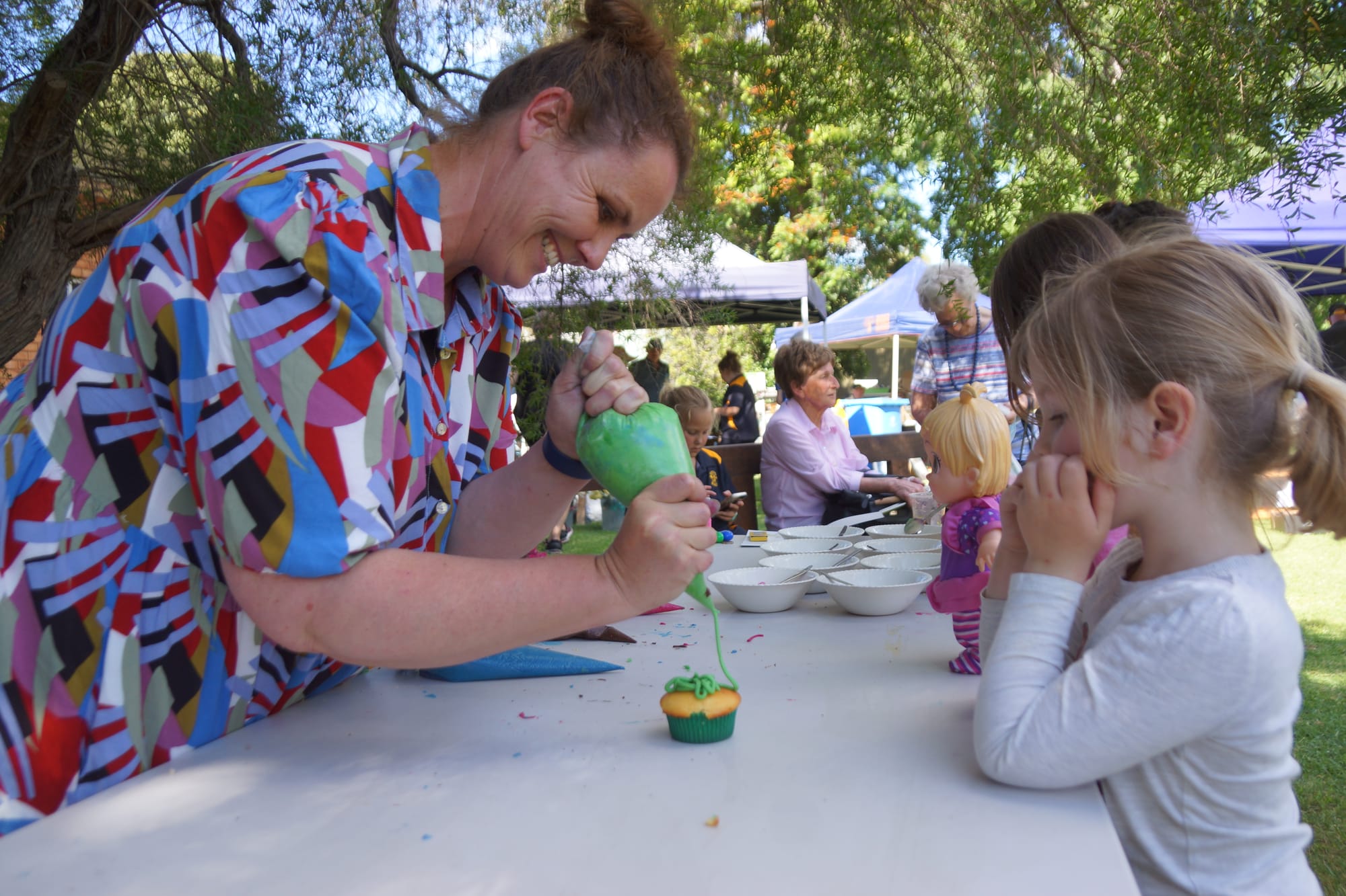 Yum... Louise Hall making a cupcake for Phoebe Mulcahy.

