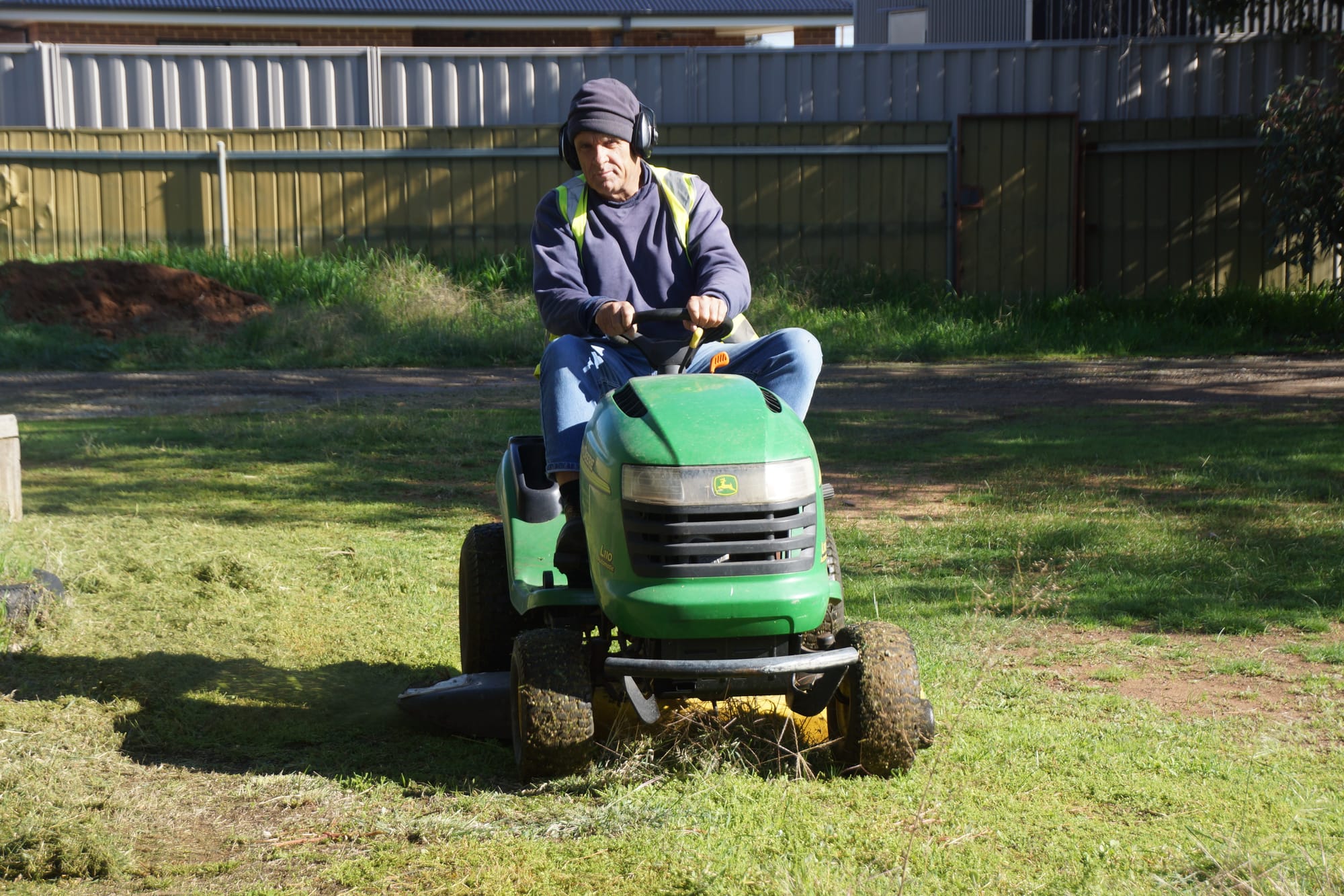His favourite thing ... John McPherson makes sure PALS’ lawns stay in tip-top condition. 