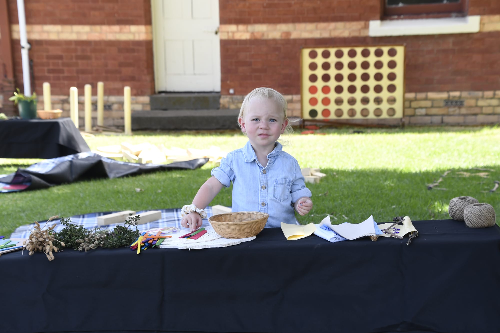 Fun for all ages ... Sophie Schram contemplates what to make out of icy-pole sticks and other materials. 