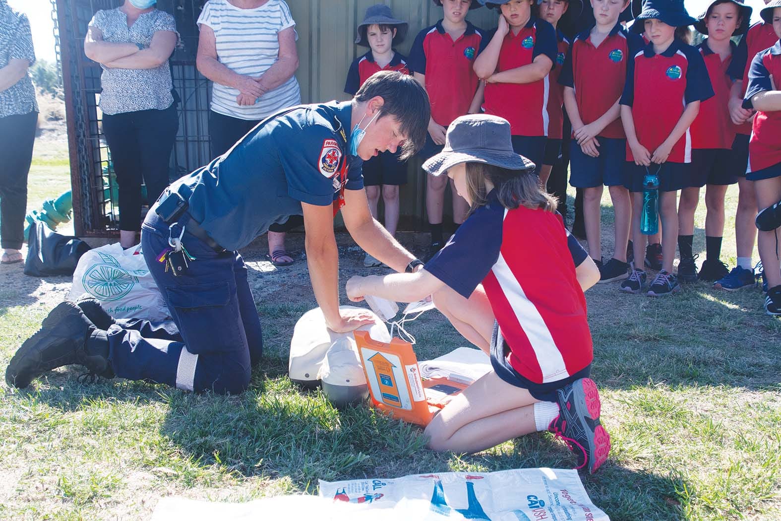 Easy peasy ... Norieul Kinross and Mercia Griffies demonstrate that using an AED machine really is child’s play.