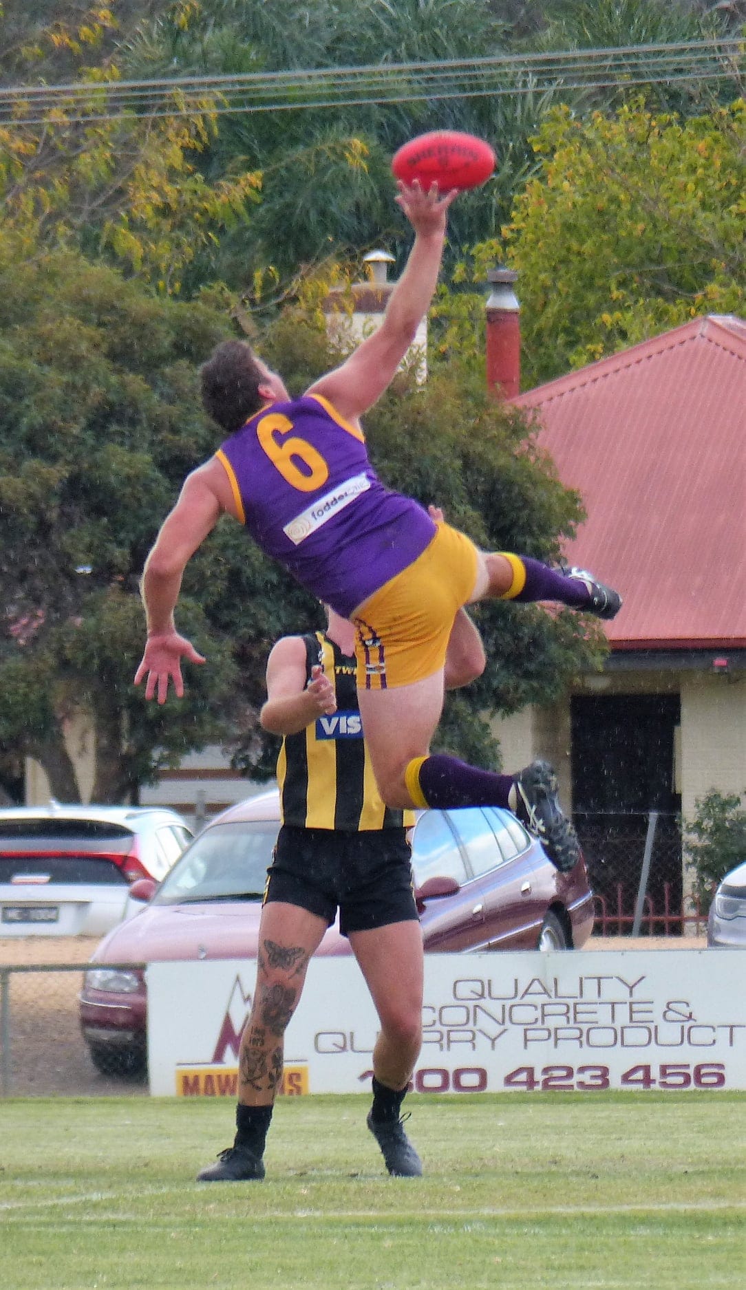 Airborne ... Jarrod Maskell flies way over his opponent in the ruck.
