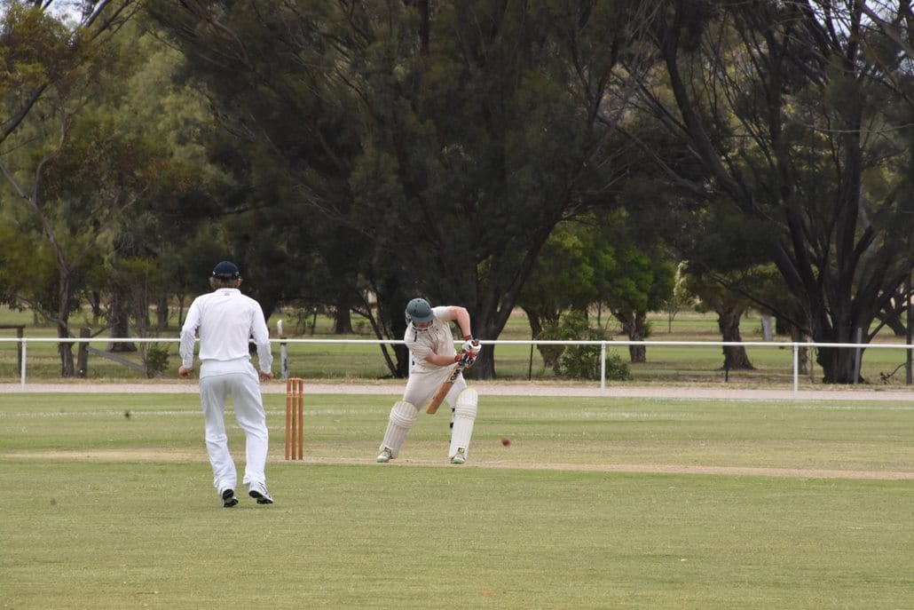 Solid... Katandra star Jedd Wright plays a forward defence as Bailey Smith waits for a catch at short cover.
