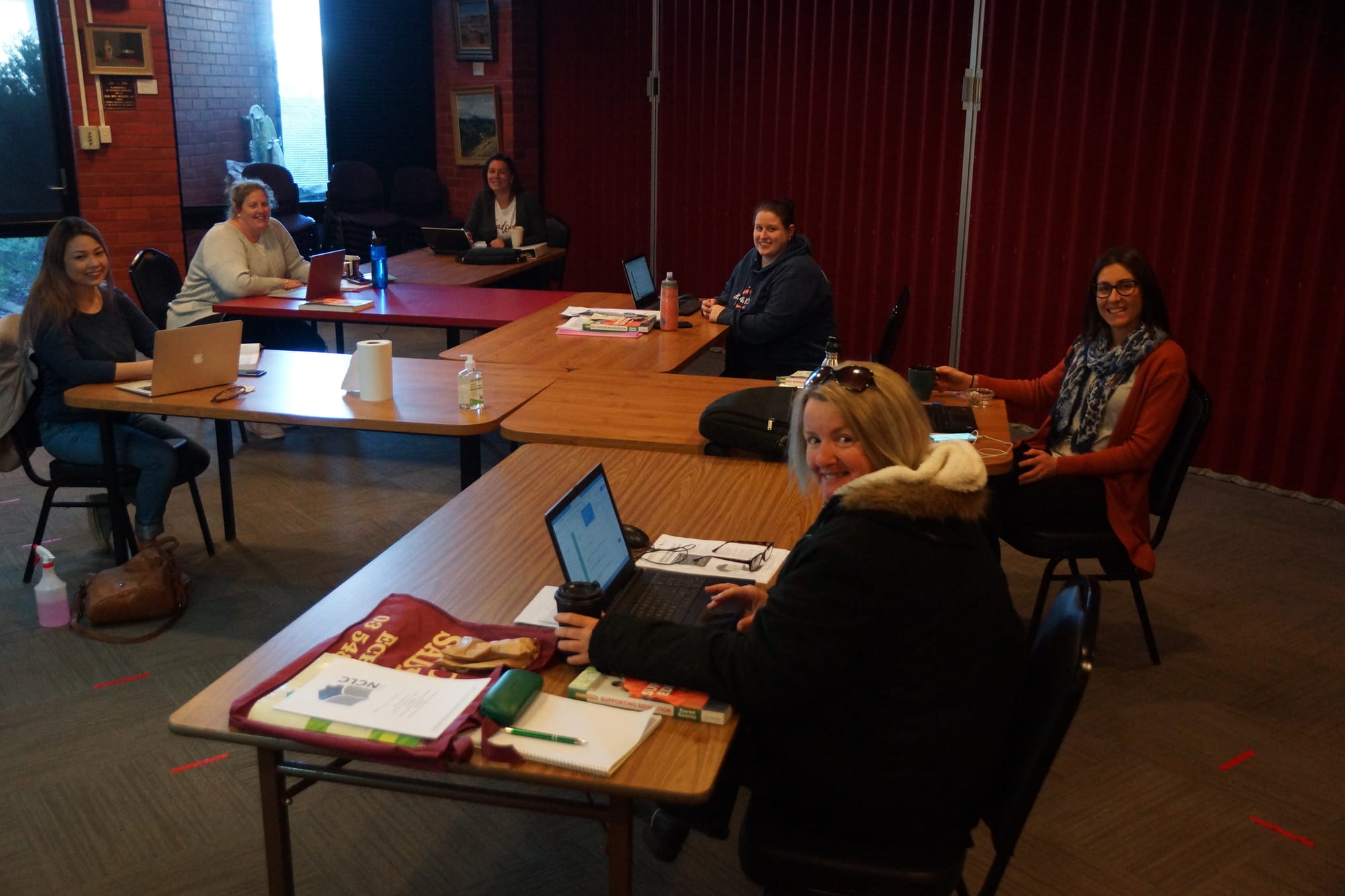 Back in the classroom ... (Clockwise from left): Teacher Alex Ahmet and students Sarah Burkitt, Amy Meyland, Megan Leavold, Leah Laidlaw and Sharon Mitchell are thrilled to get back to on-site learning.