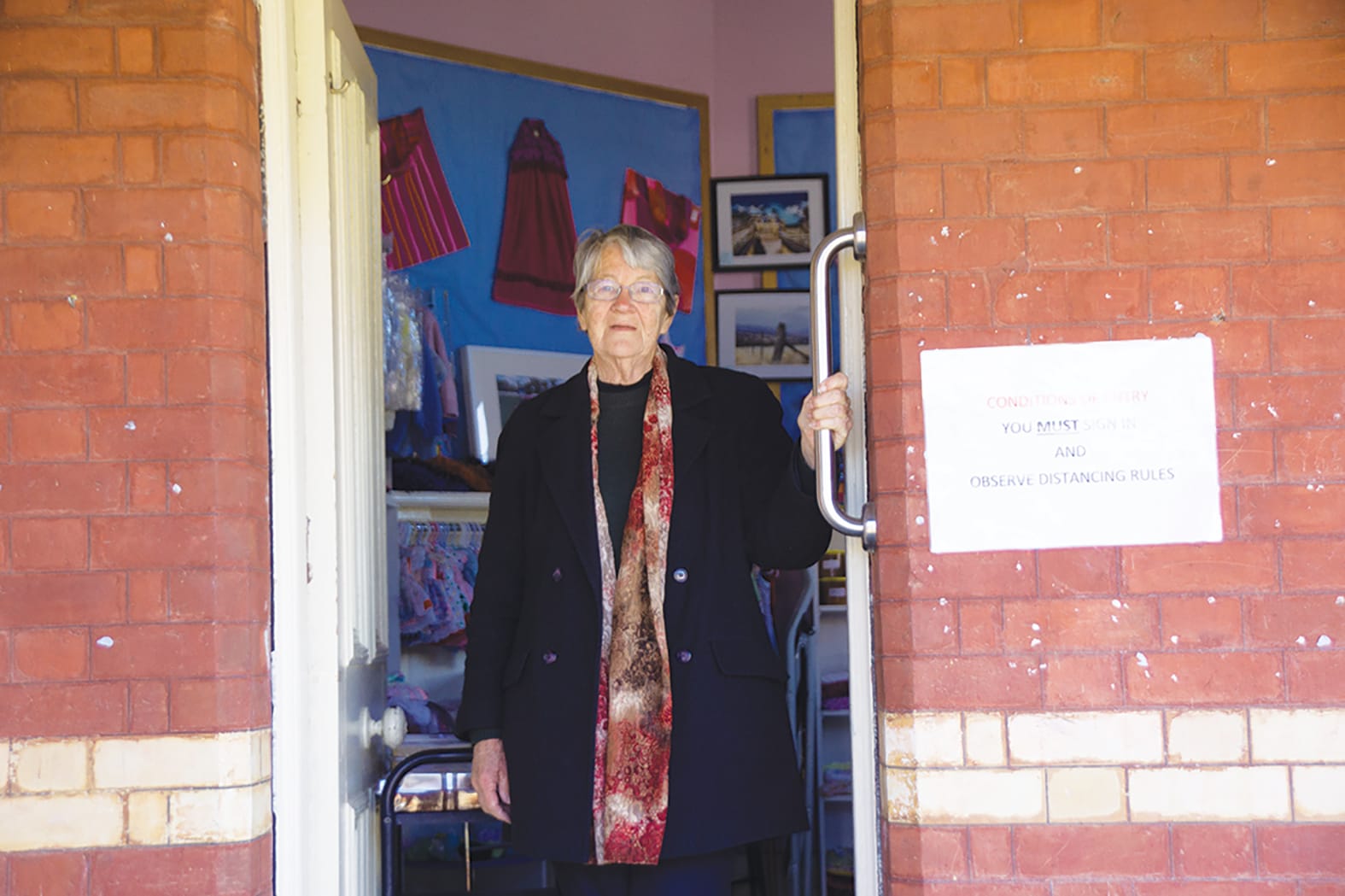 Open for business ... Court house craft shop volunteer Lyn Cline is pleased to be back behind the counter. 