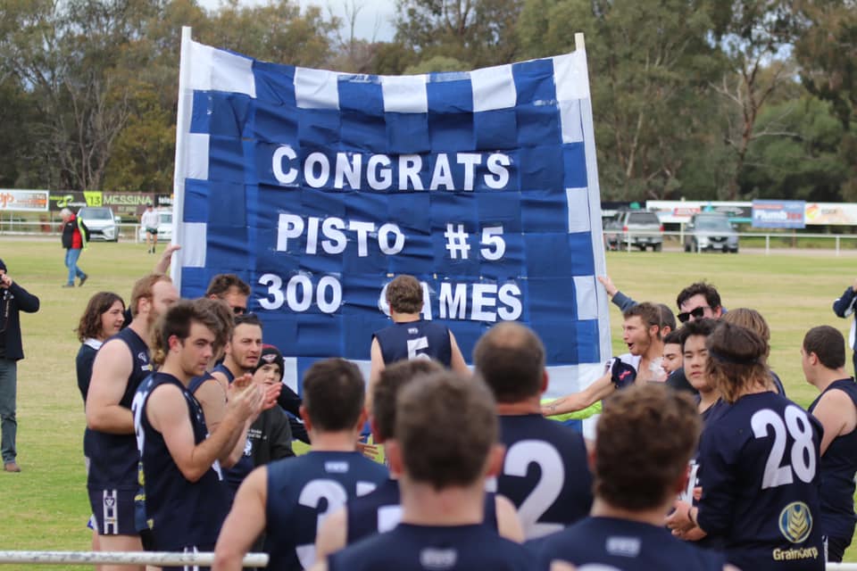 300 and counting ... Paul ‘Pisto’ Collins runs out onto the ground for the 300th time for Numurkah. 
