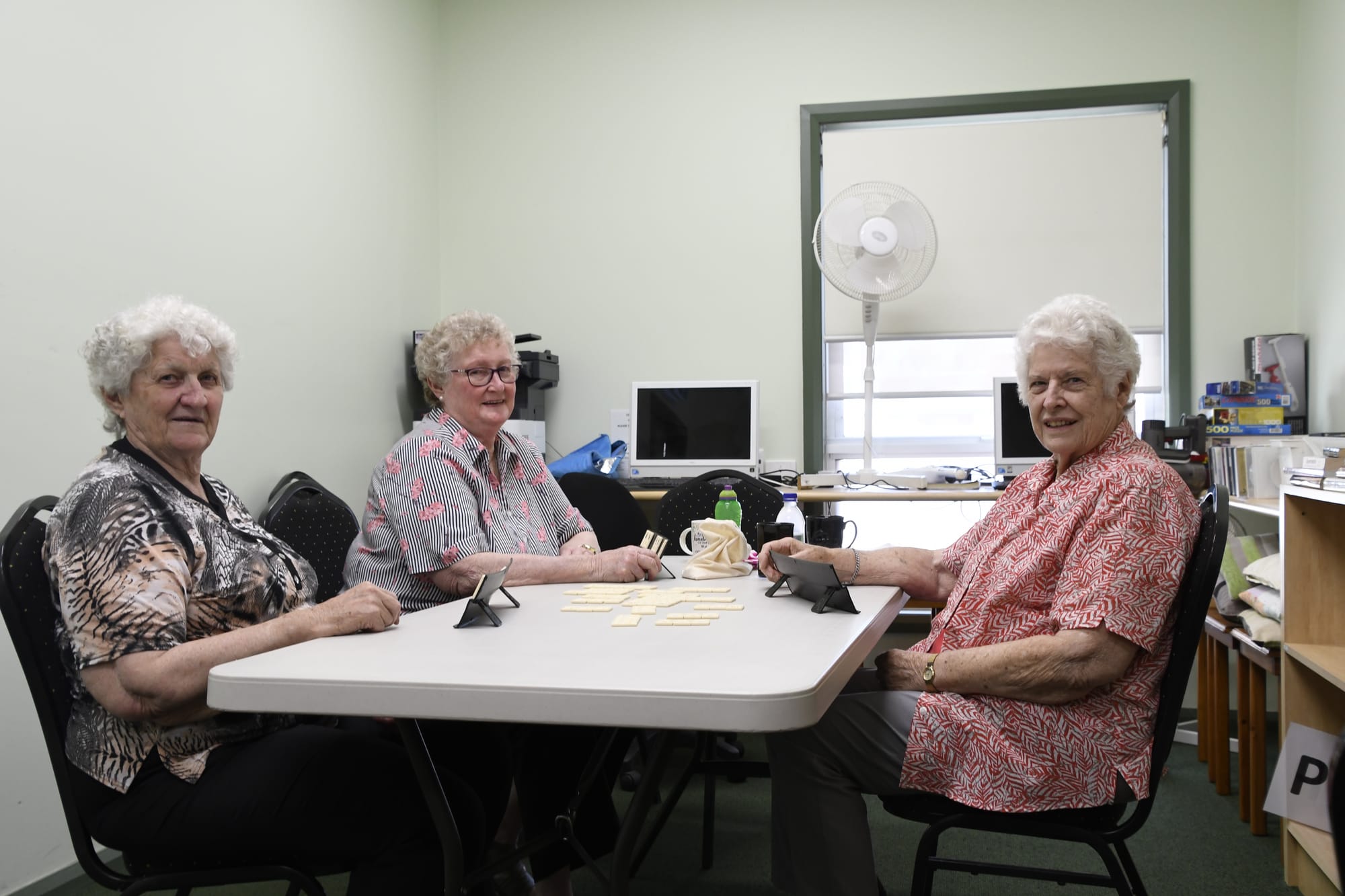 Great to be back ... Marj Hausfld, Vals Usher and Fran Sutton have missed the companionship and competition to be found at Numurkah seniors hub. 