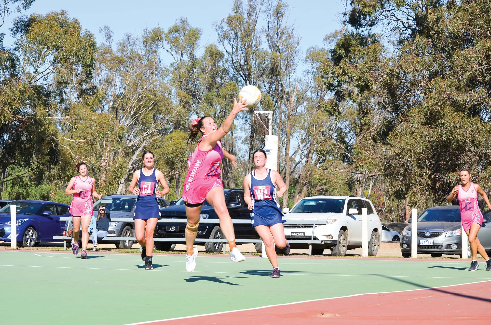 Fingertips ... Kirsty Hommes at full stretch, trying to save a ball from going out of bounds. 
