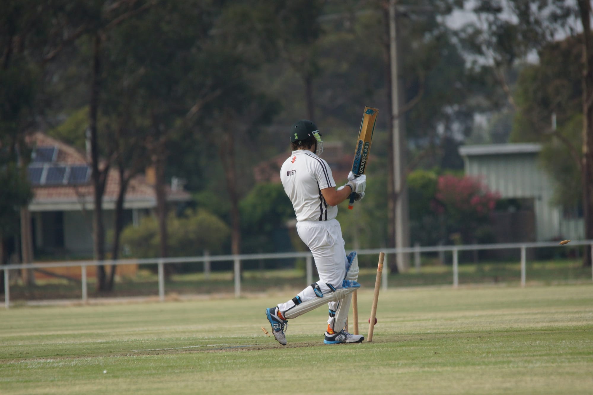 Death rattle … Dusty Ebborn turns to see his stumps shattered.