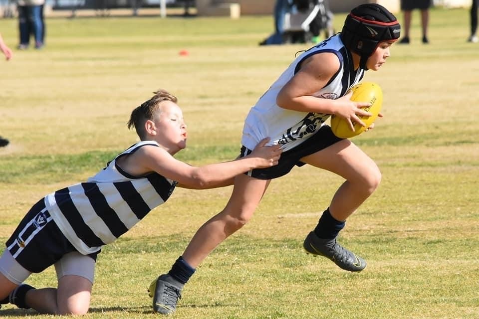 Shrugging the tag ... Arthur Smith shows a clean pair of heels.
