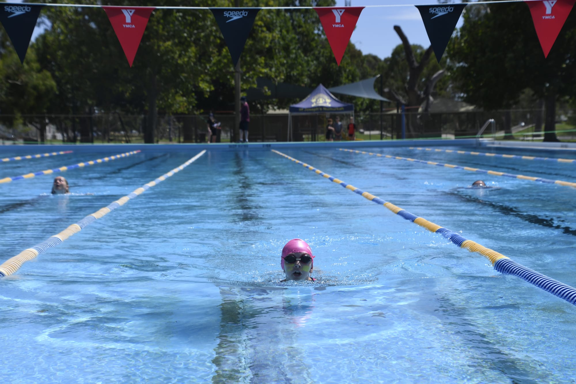 Bringing it home ...Suma Neyland breaststrokes her way to victory for McCarthy house in the grade four girls 50 metres event.
