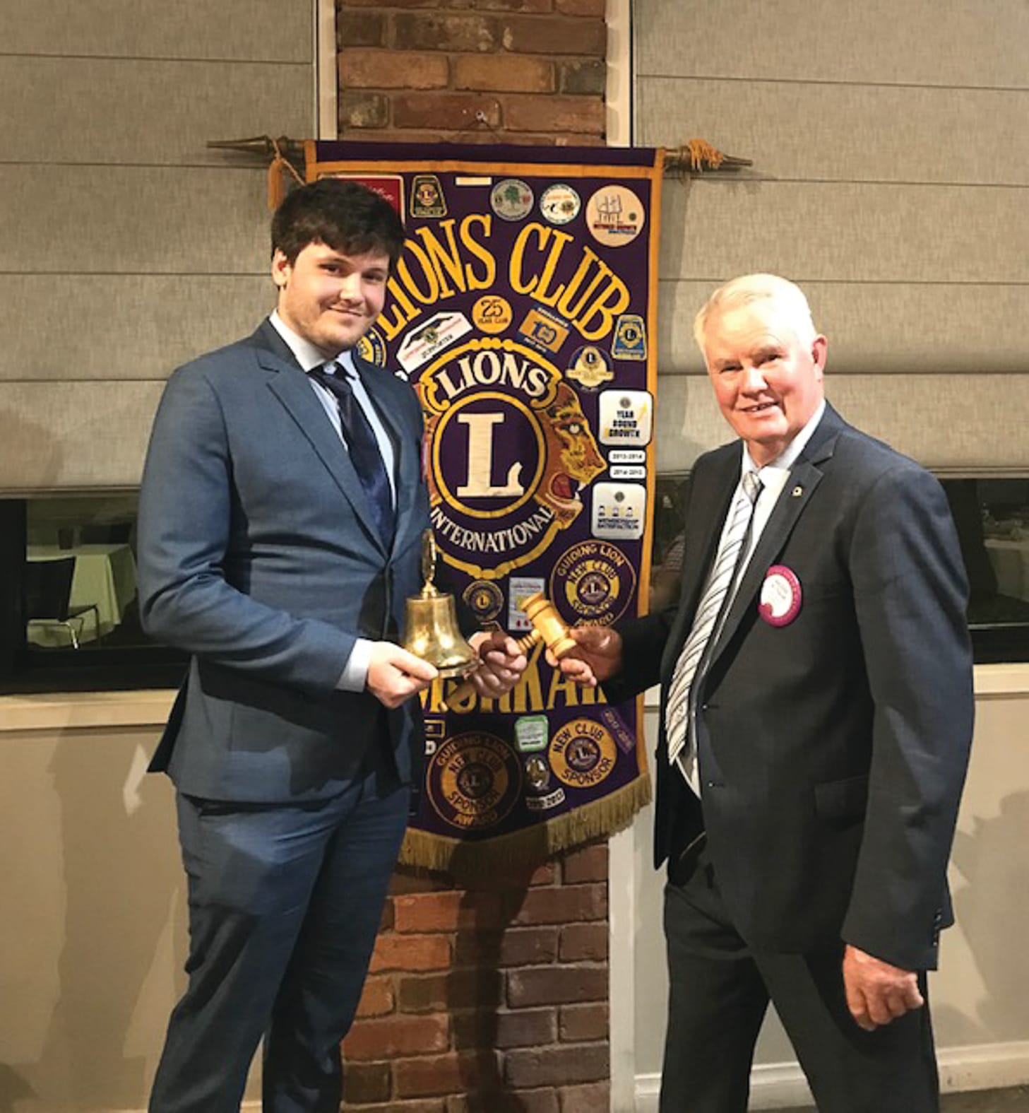 New blood... Incoming president Jack Fischer receive the reigns from outgoing president Keith Nicoll.