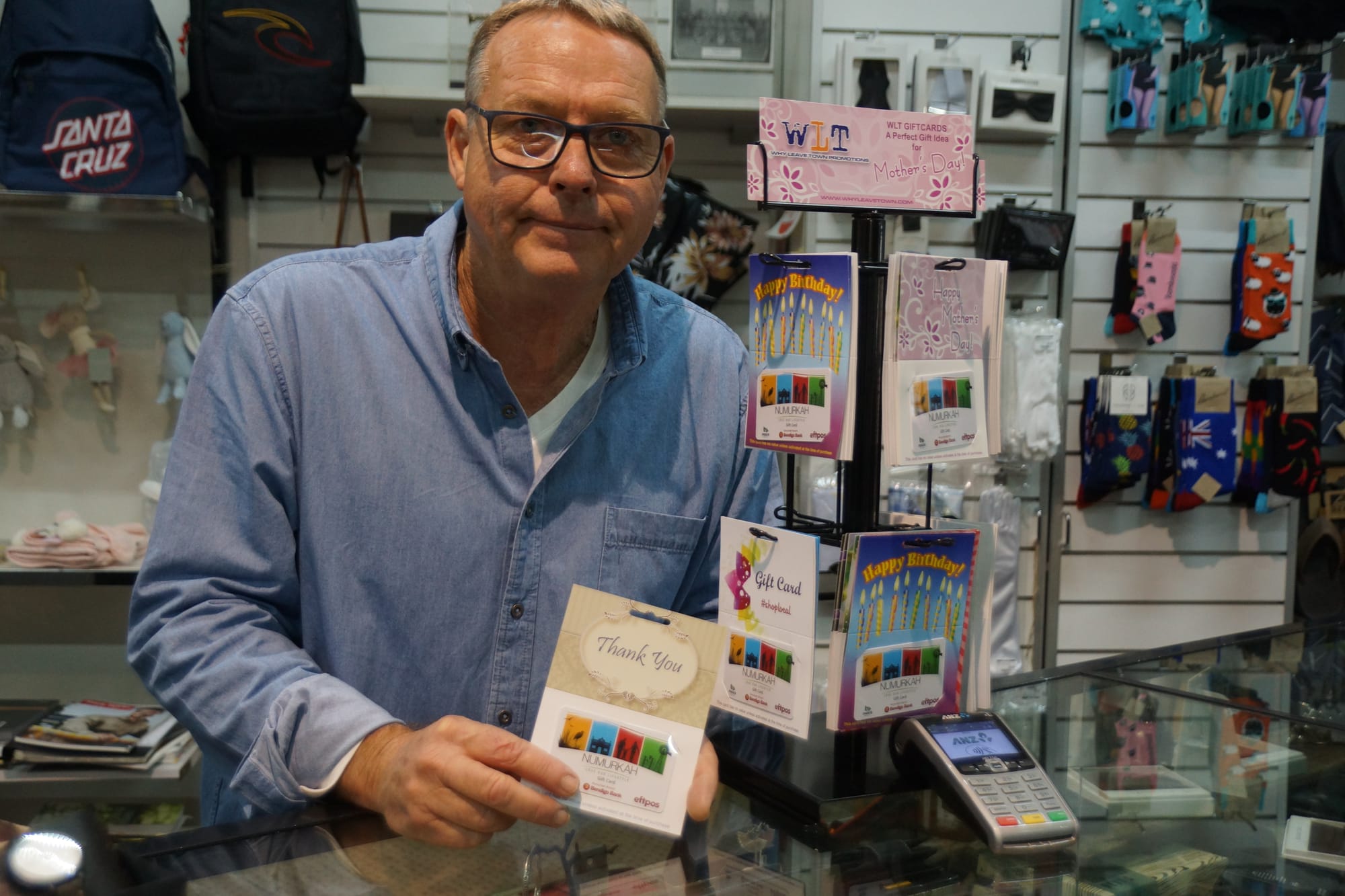 The perfect gift for the whole community ... Numurkah Love Our Lifestyle member Duncan McPherson is looking forward to accepting Why Leave Town eftpos gift cards in his Melville Street store. 