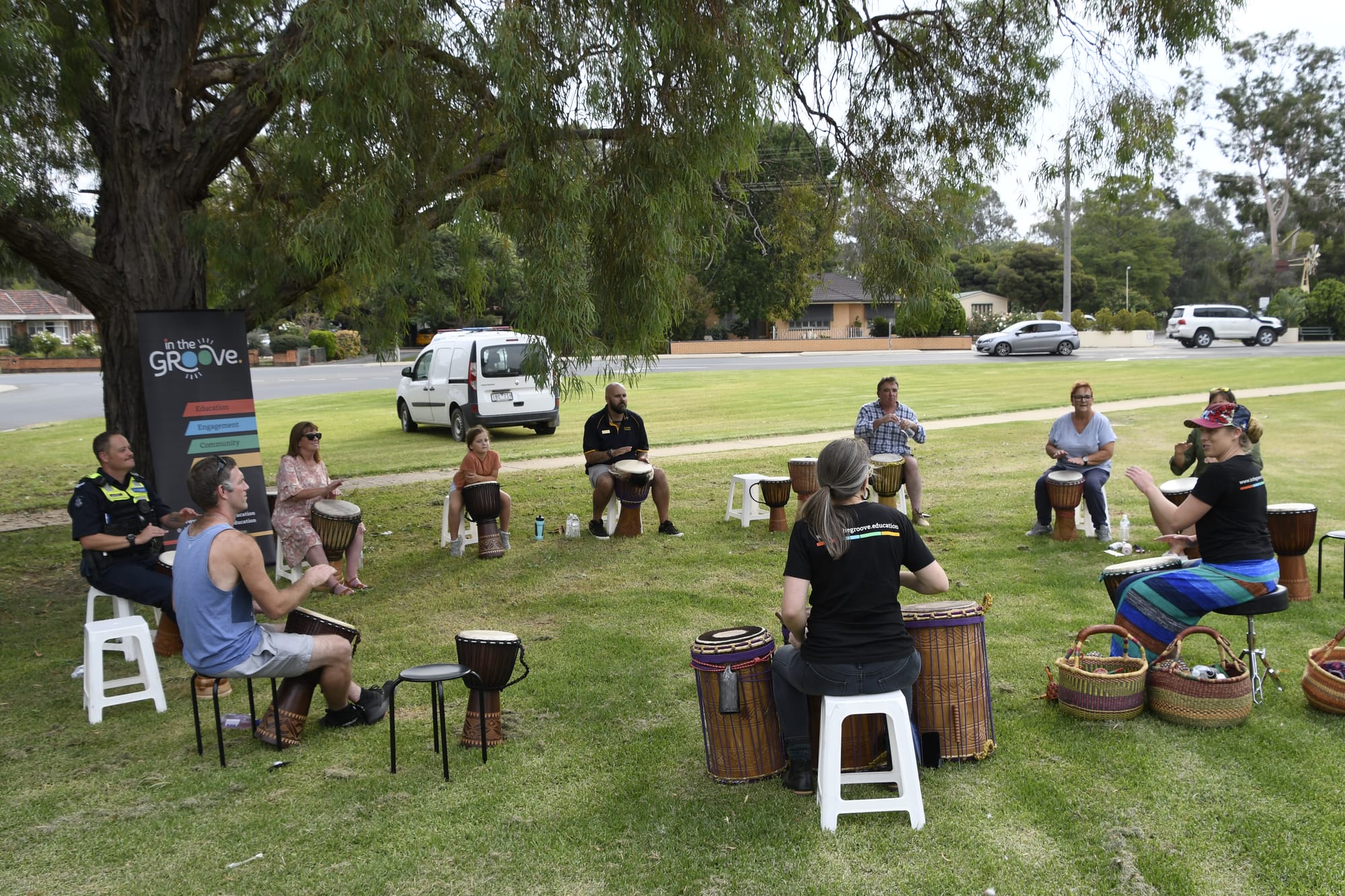Feeling groovy ... Drumming sessions proved popular with adults and kids alike.

