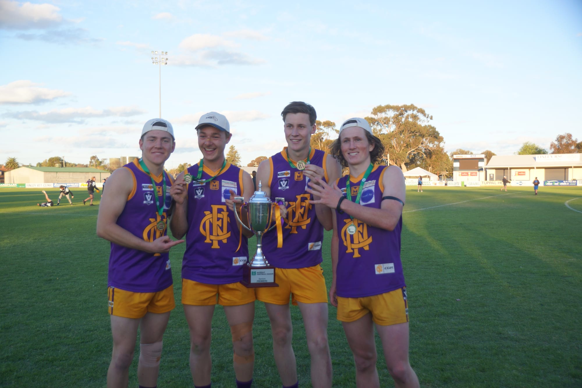 Young guns … Ben Armstrong, Tom Byrnes, Harrison Hawks and Clancy Congues with their first premiership medallions for Nathalia.