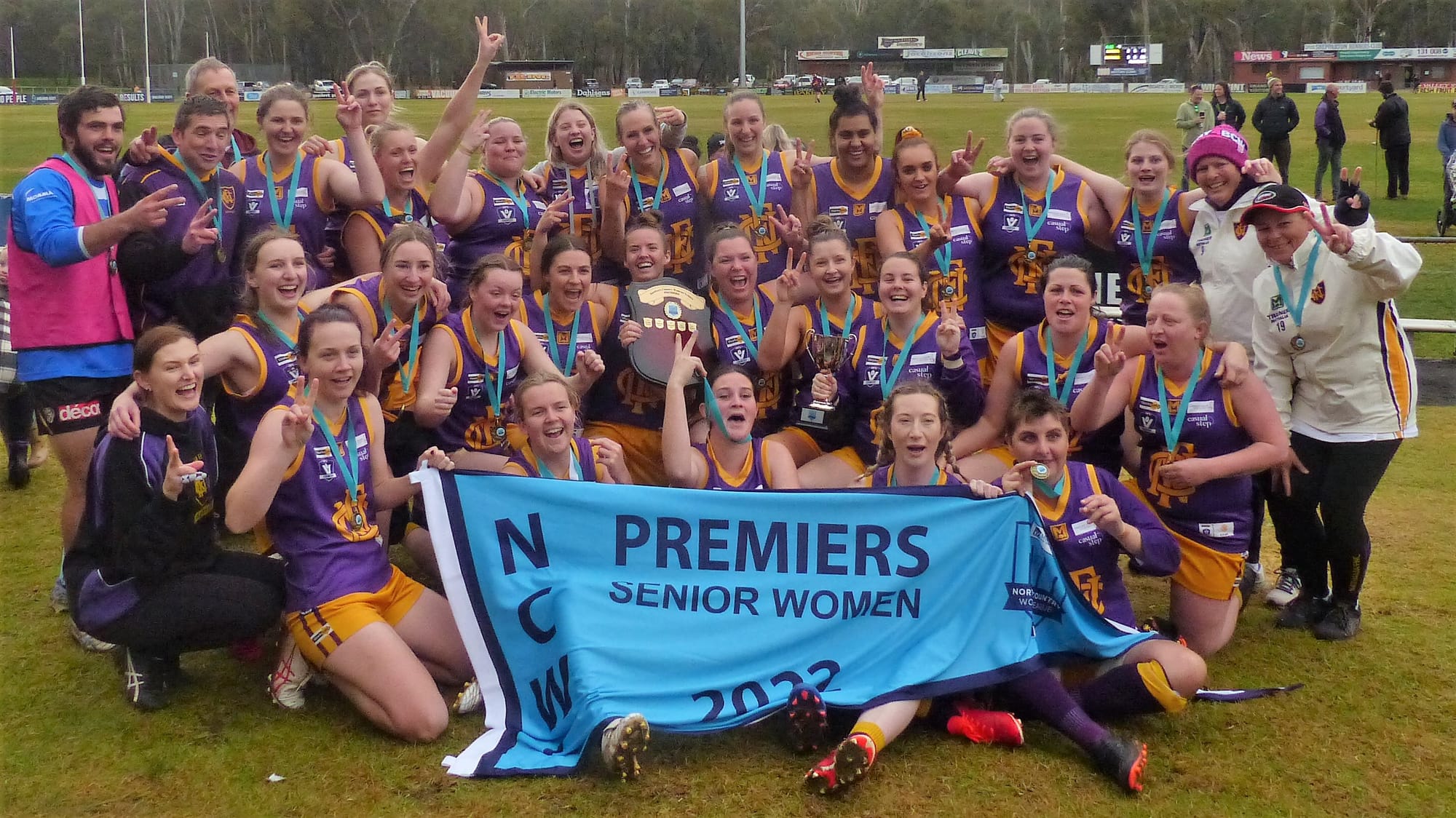 Back-to-back ... Nathalia women’s football team celebrate their second consecutive premiership.