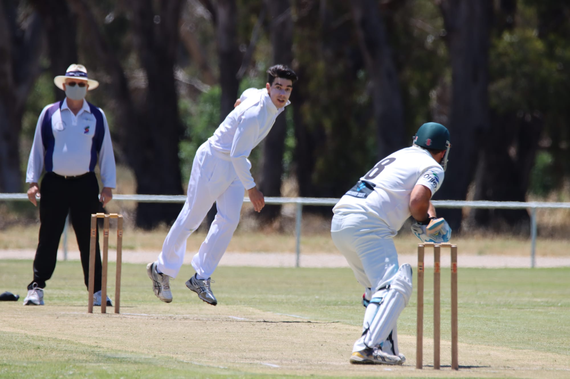 Right arm over ... Dylan Cox sends one down to Ben Daniel, who made eight on Saturday.
