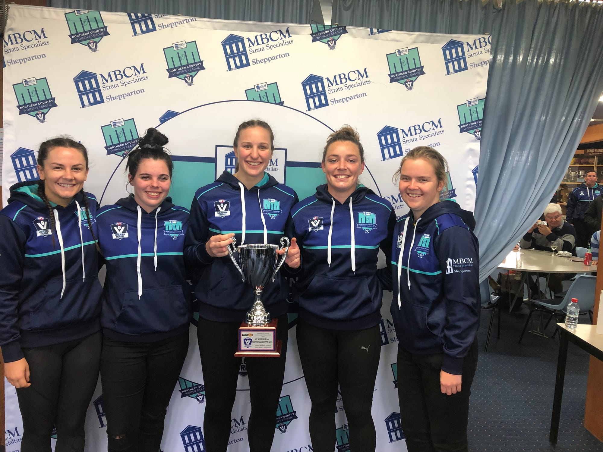 Winning reps ... Nathalia footballers who represented the Northern Country Women’s League with winning cup, (from left): Vanessa Ward, Marni Bell, Tegan Sutton, Sharnah Stevens and Abby Favaro.
