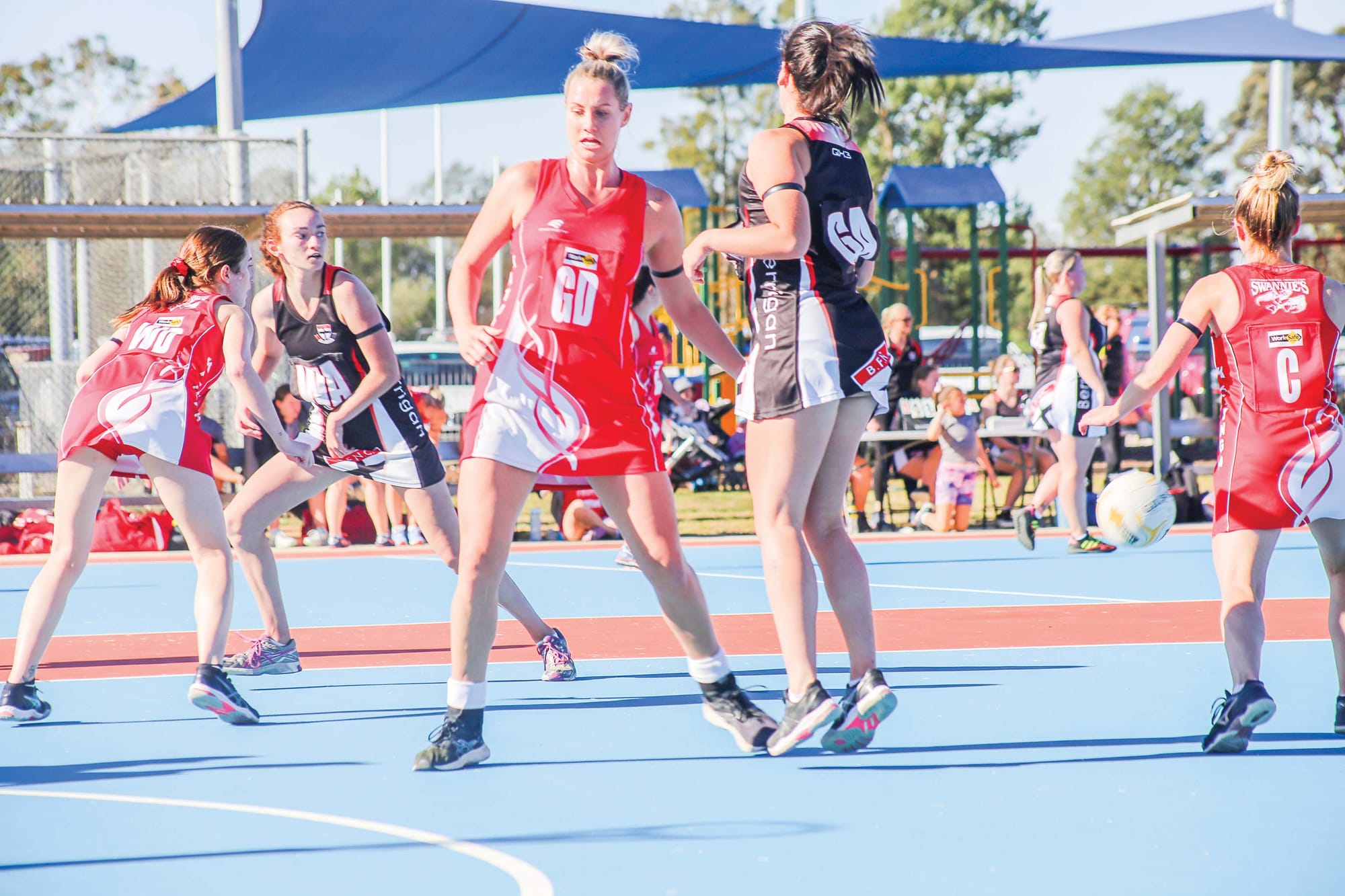 On her toes ... Sarah Weideman checks her Berrigan opponent closely in defence. 