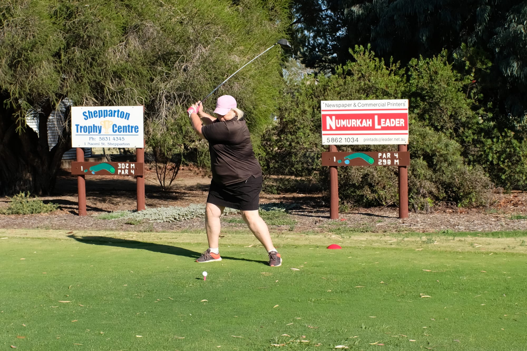 Back swing ... Karen Harper at the tee on the par four first. 
