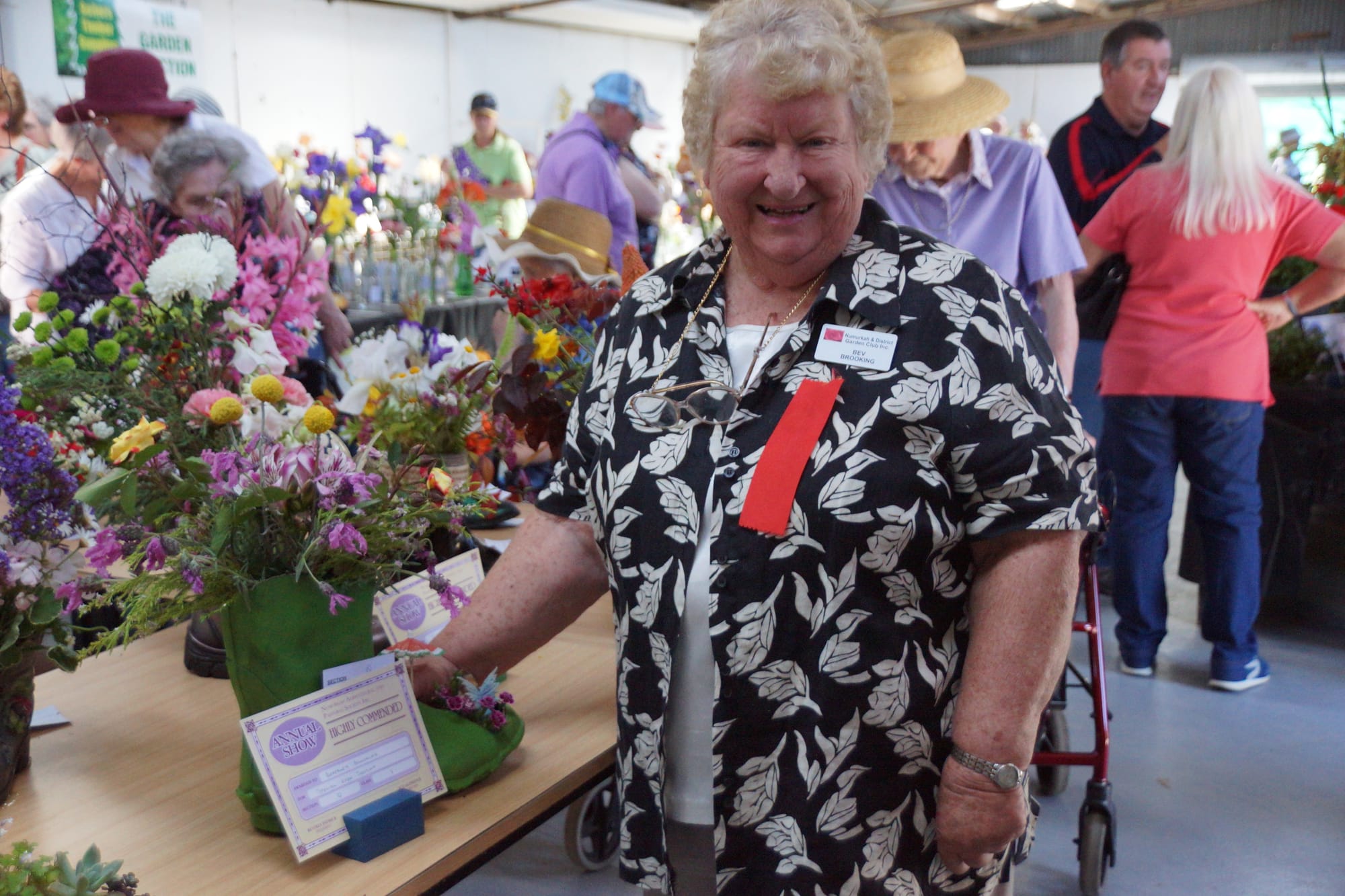 A boot full of blooms ... Bev Brooking was thrilled to receive a highly commended for her floral entry.