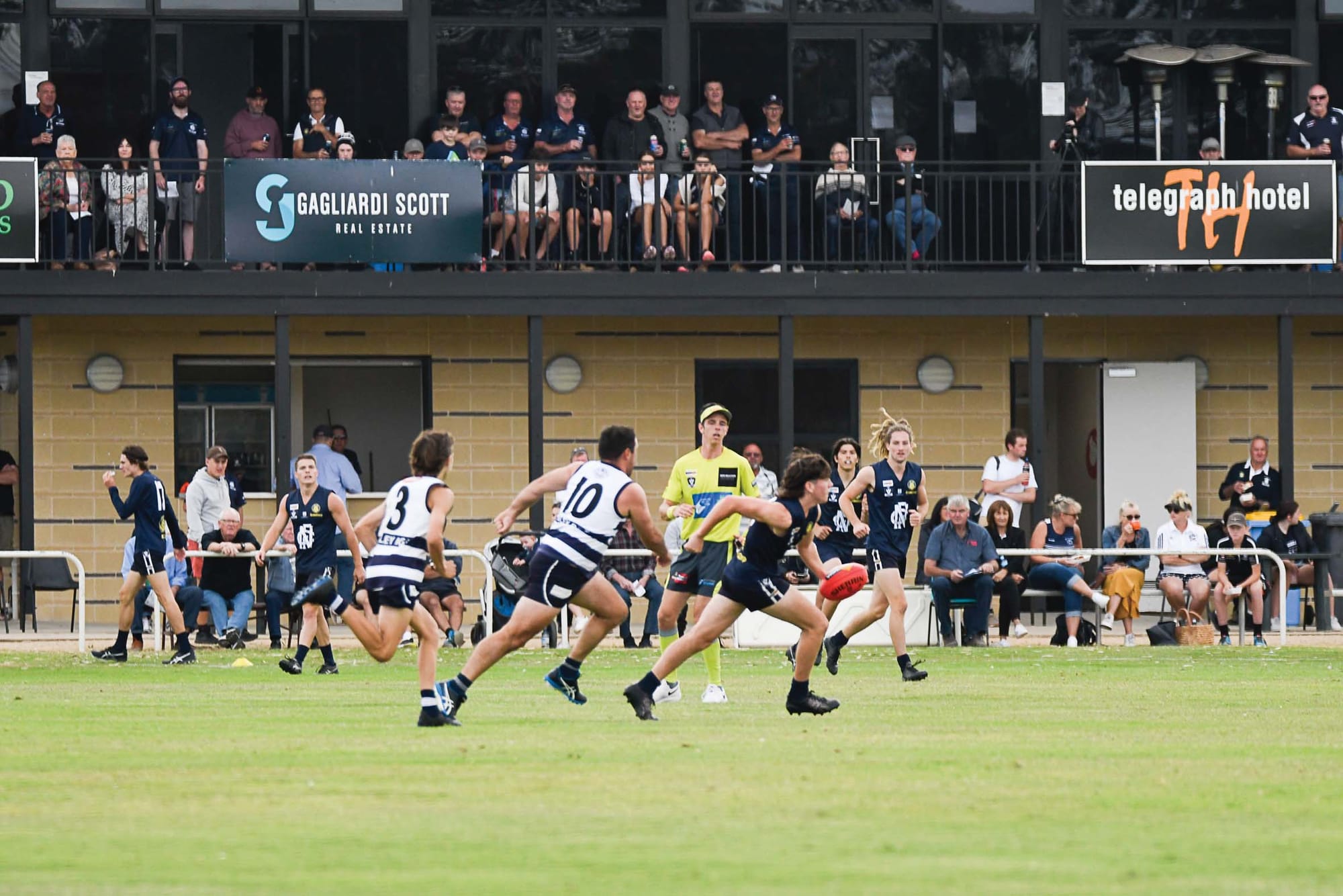 Can’t catch him ... Flynn Penberthy gets a handball away, with a Finley player in pursuit. 

