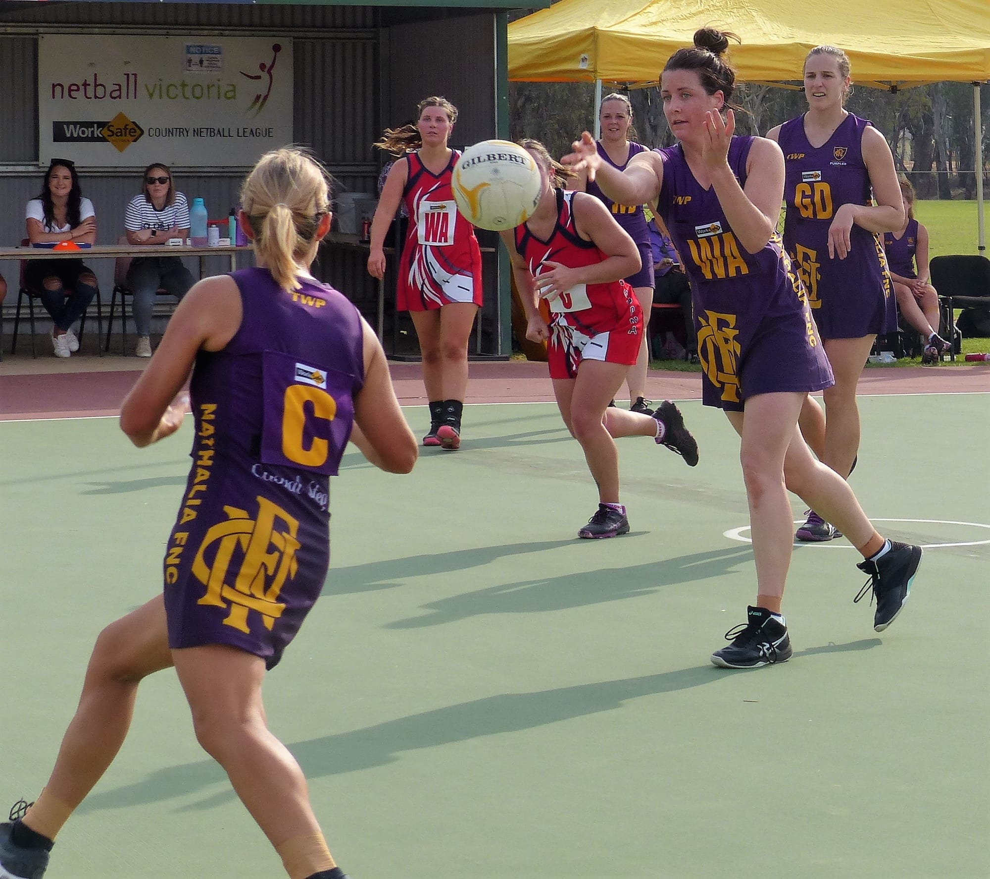 On the move ... Lisa Kellow passes the ball to Emma McDonald in A-grade last Saturday. 
